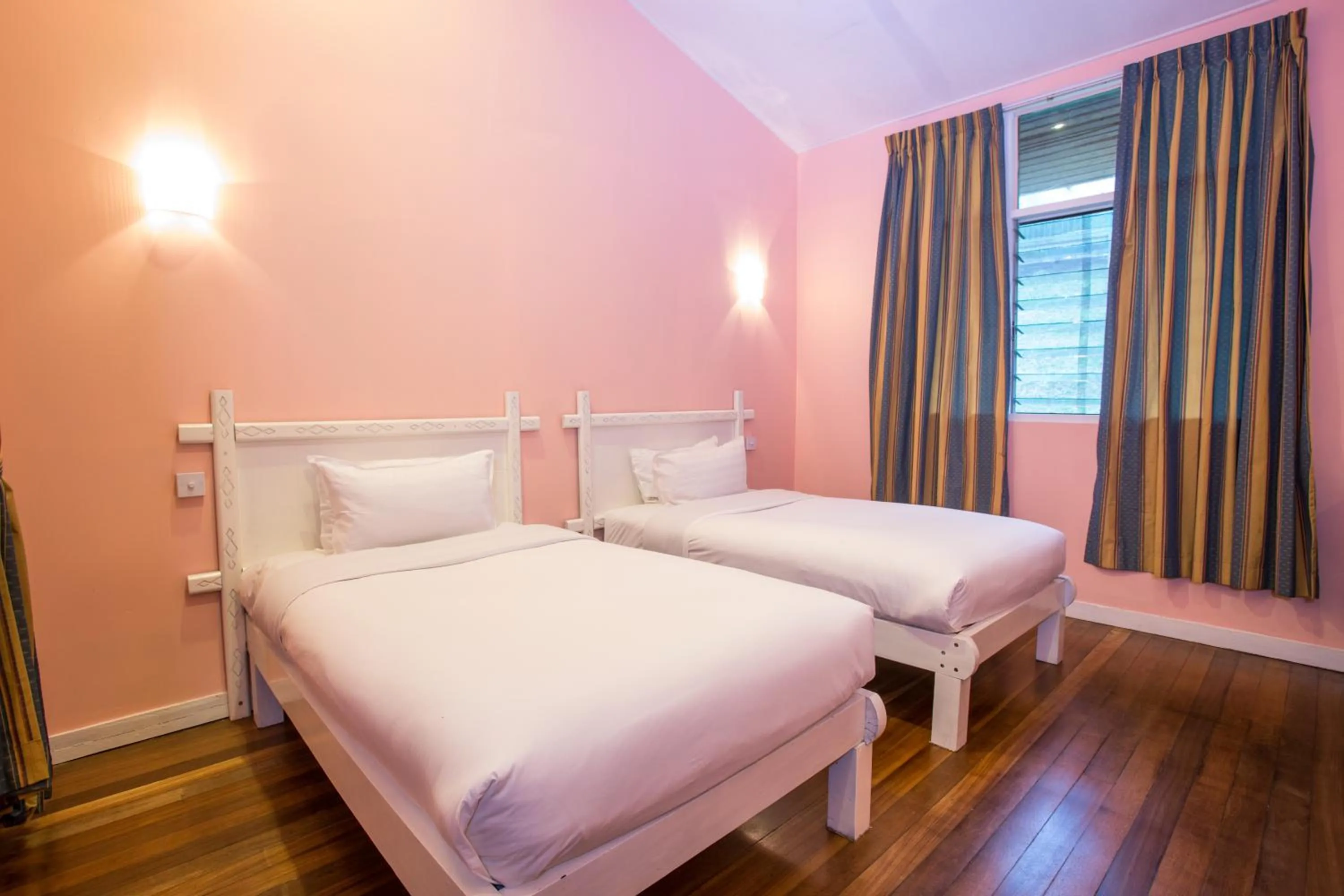 Bed in Sutera Sanctuary Lodges At Kinabalu Park