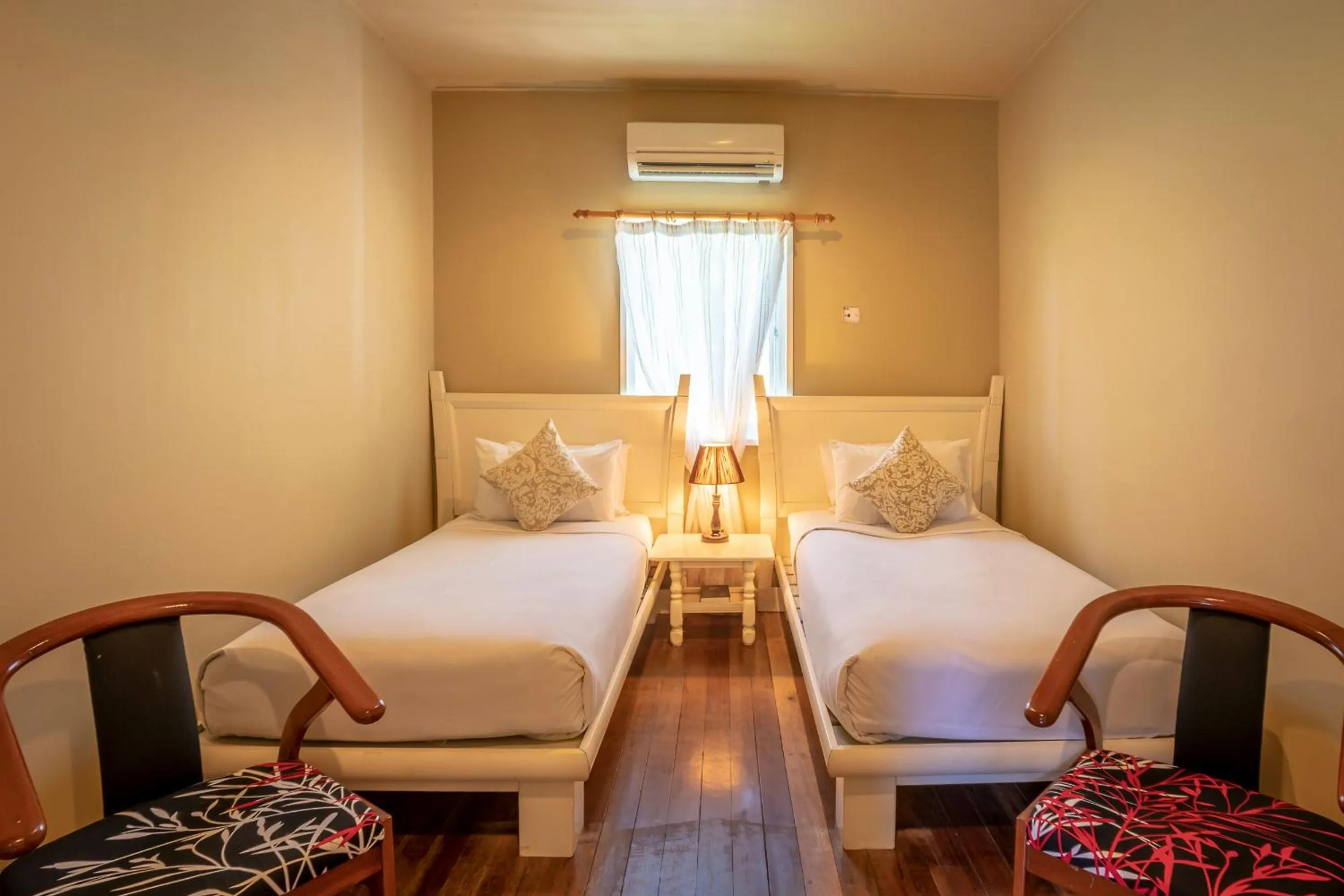 Bed in Sutera Sanctuary Lodges At Poring Hot Springs