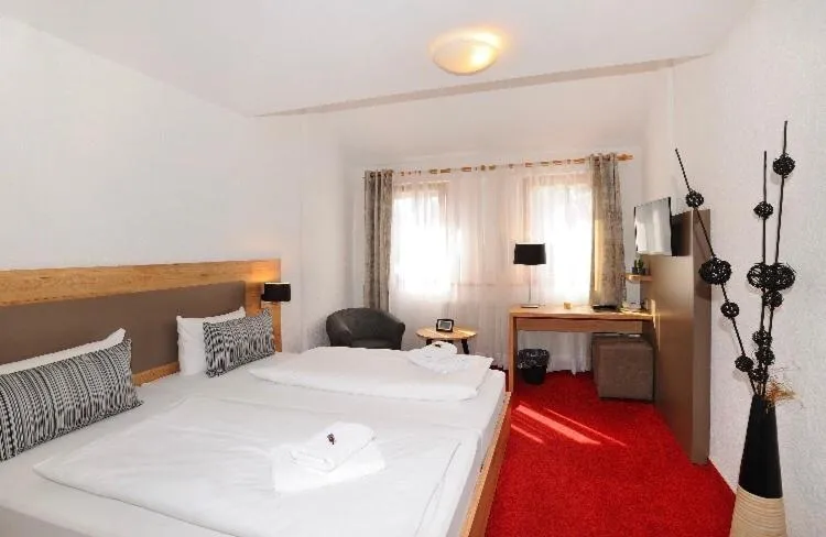 Bed in Vico's Hotel & Restaurant Asperg