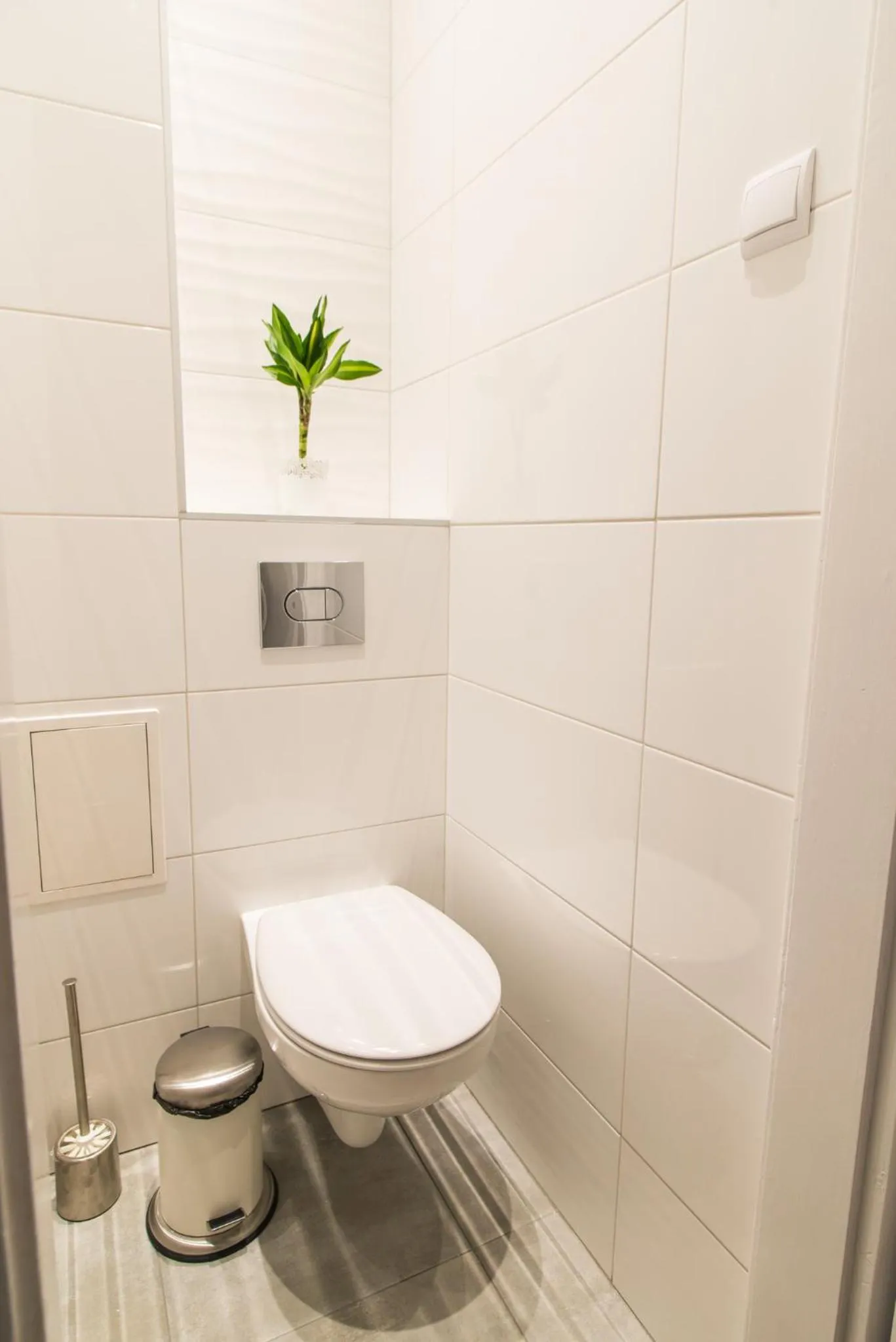 Toilet in Trip Apartments
