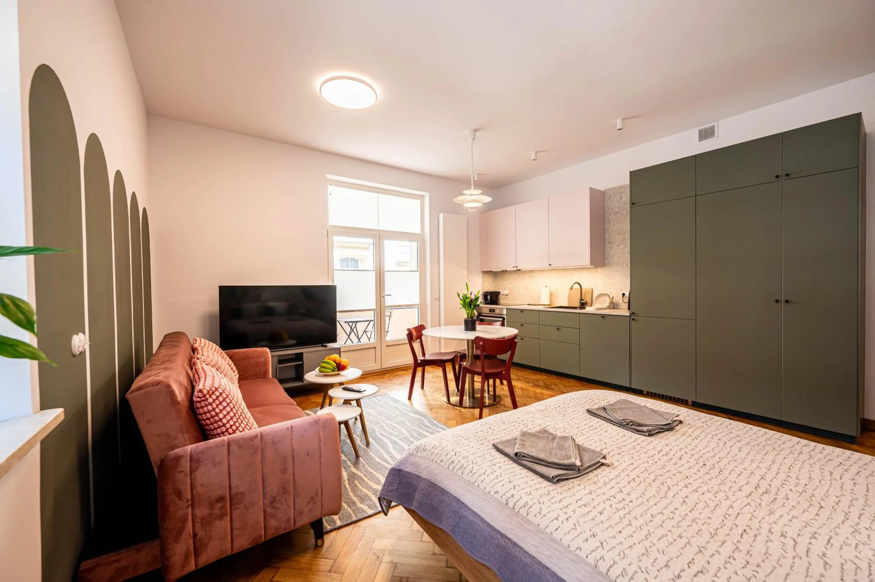 Bed in Trip Apartments