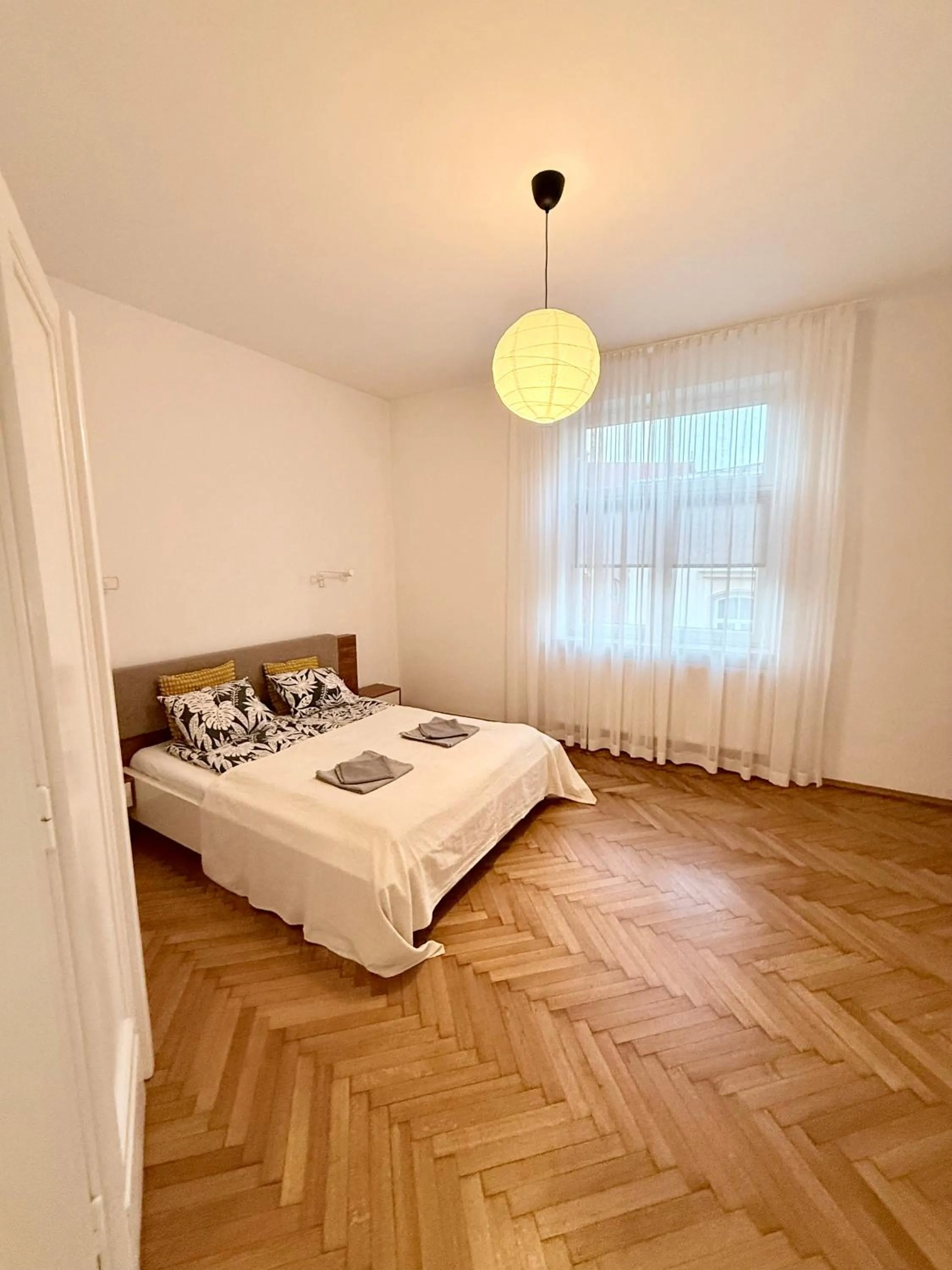Bed in Trip Apartments
