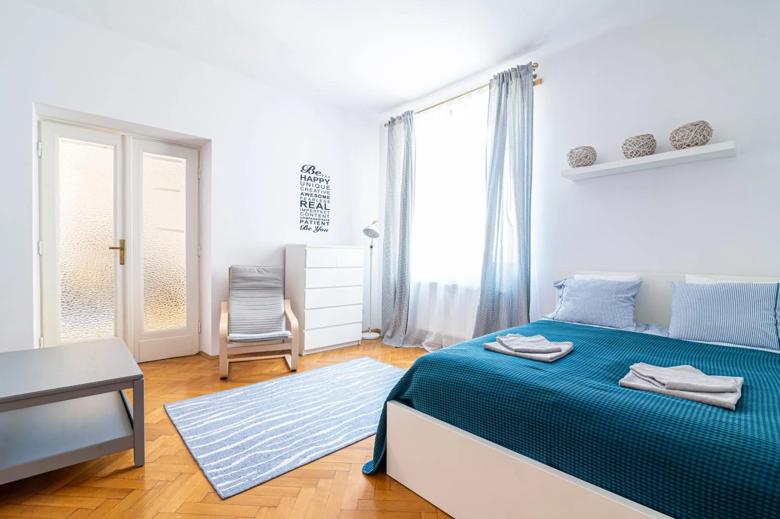 Bed in Trip Apartments