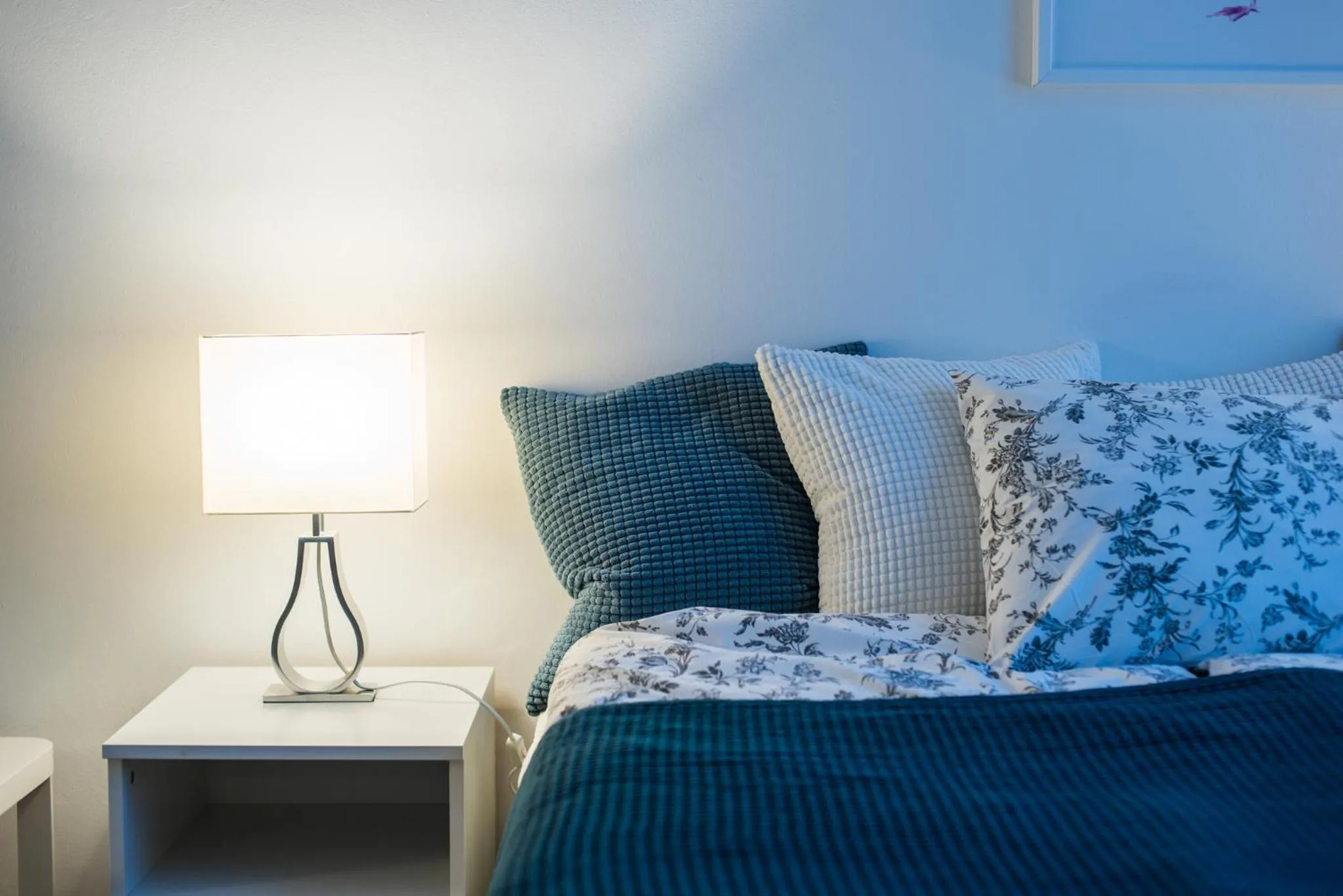 Bed in Trip Apartments