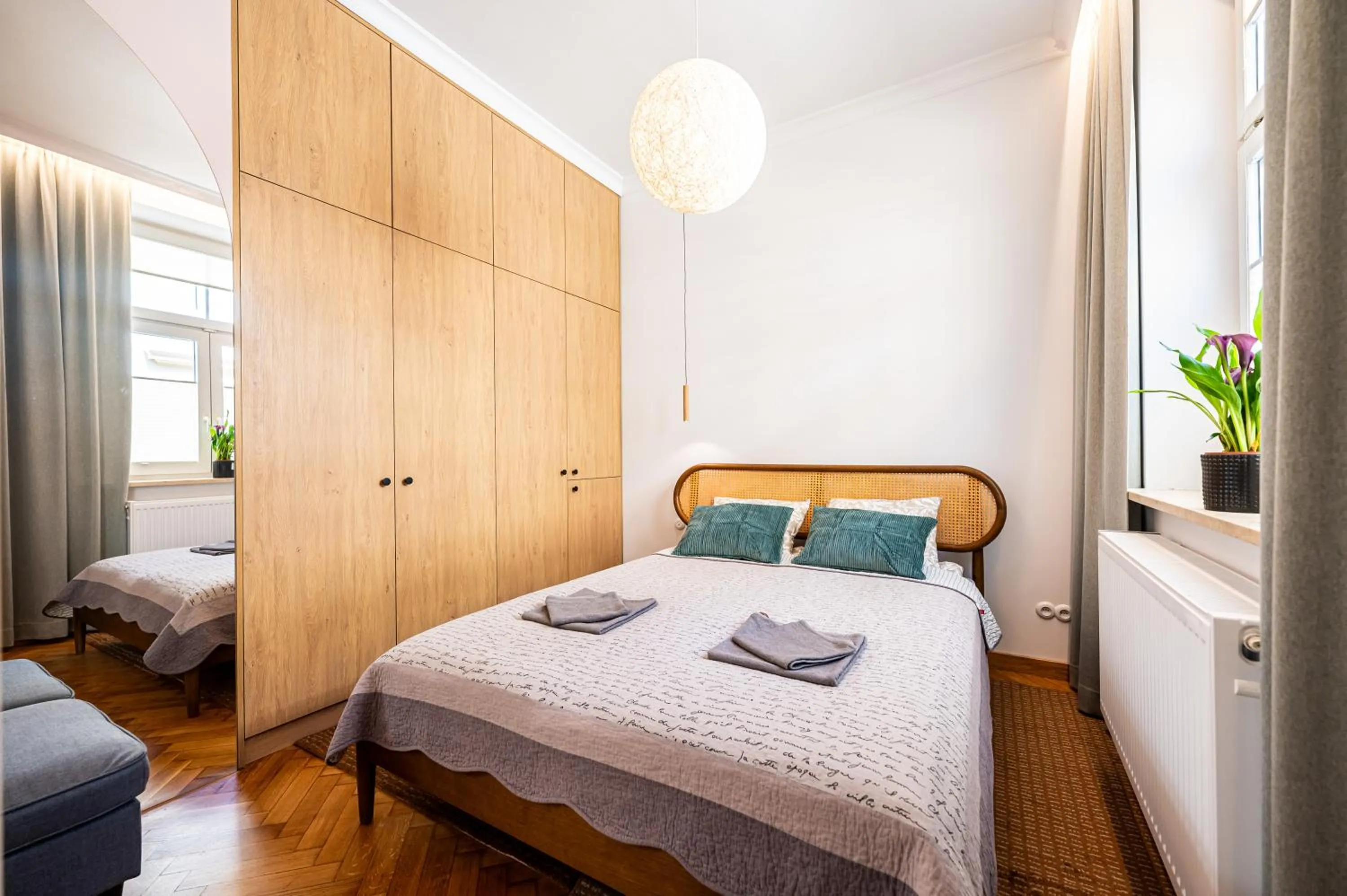 Bed in Trip Apartments