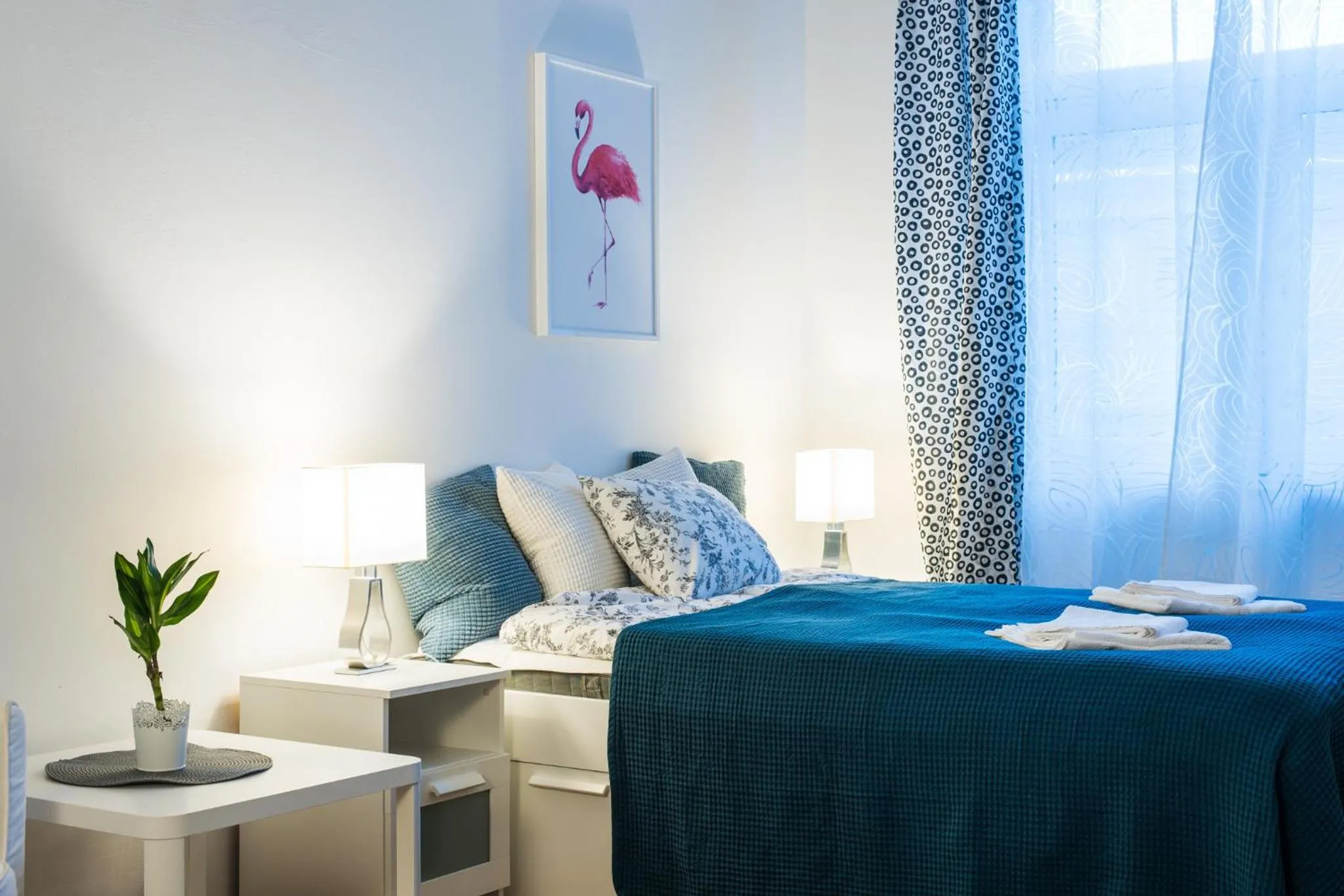 Bed in Trip Apartments