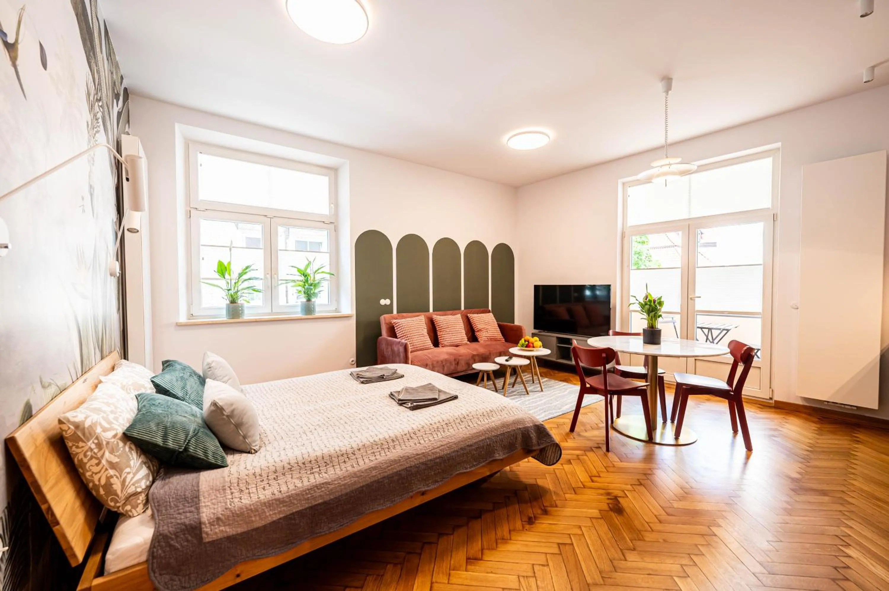Bed in Trip Apartments