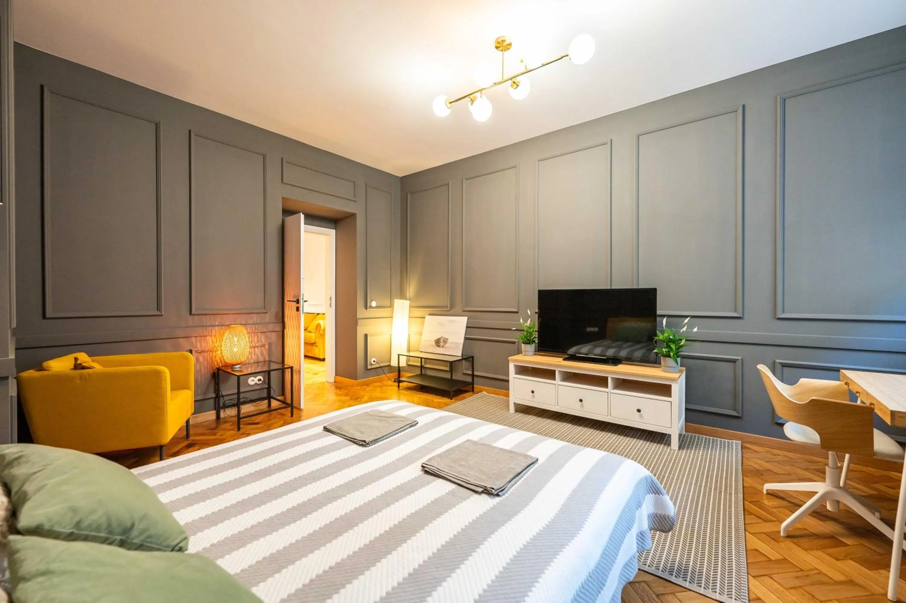 Bed in Trip Apartments