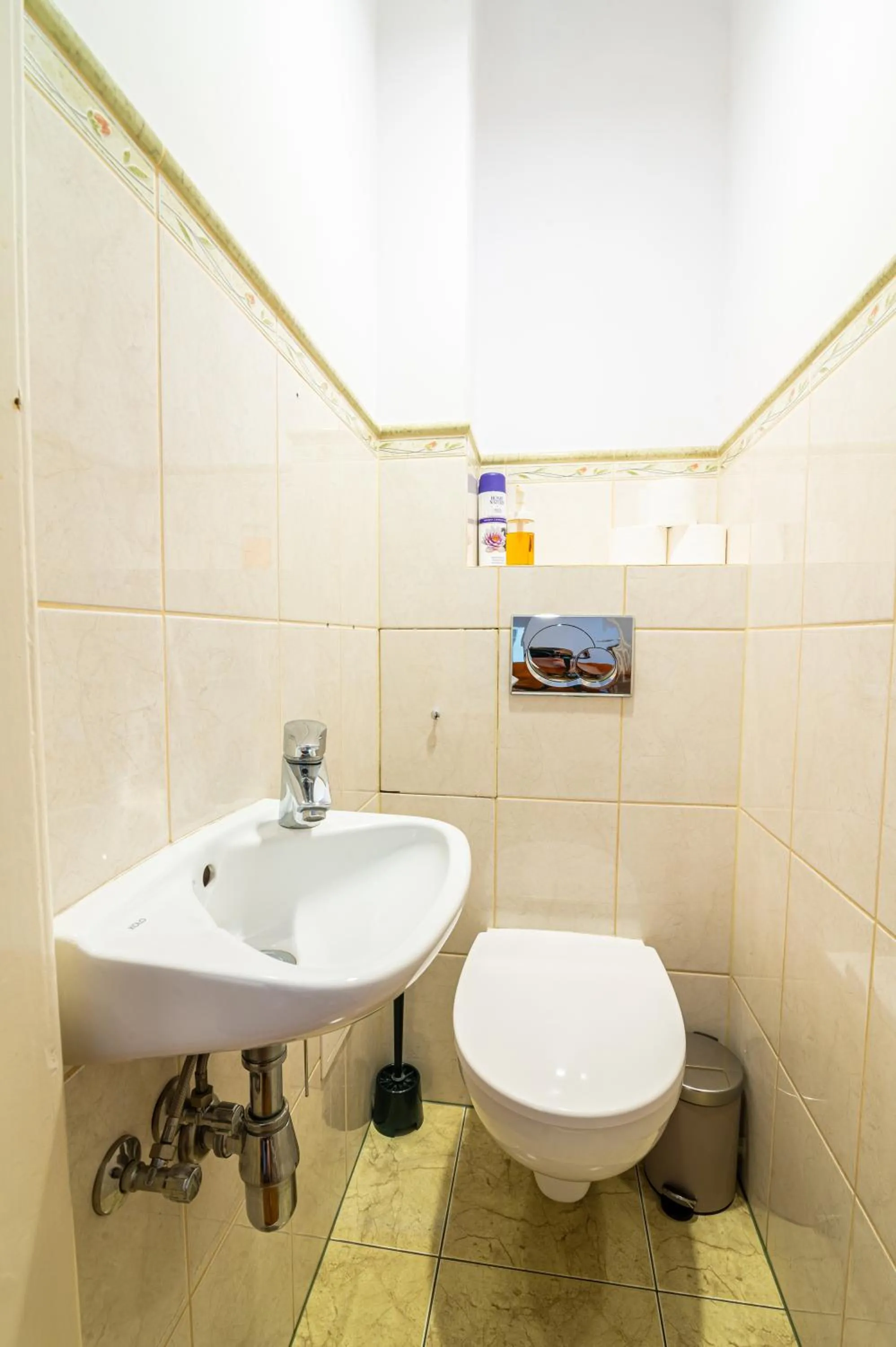 Toilet in Trip Apartments