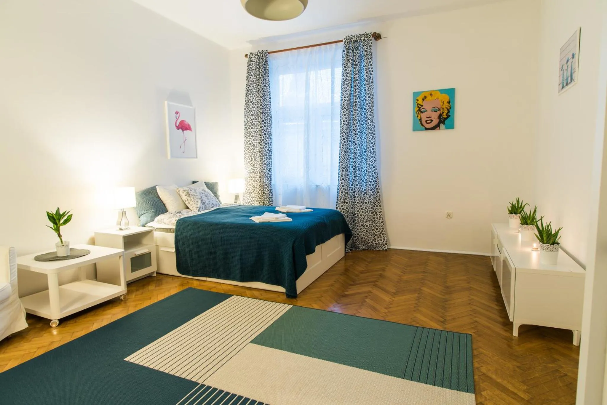 Bed in Trip Apartments