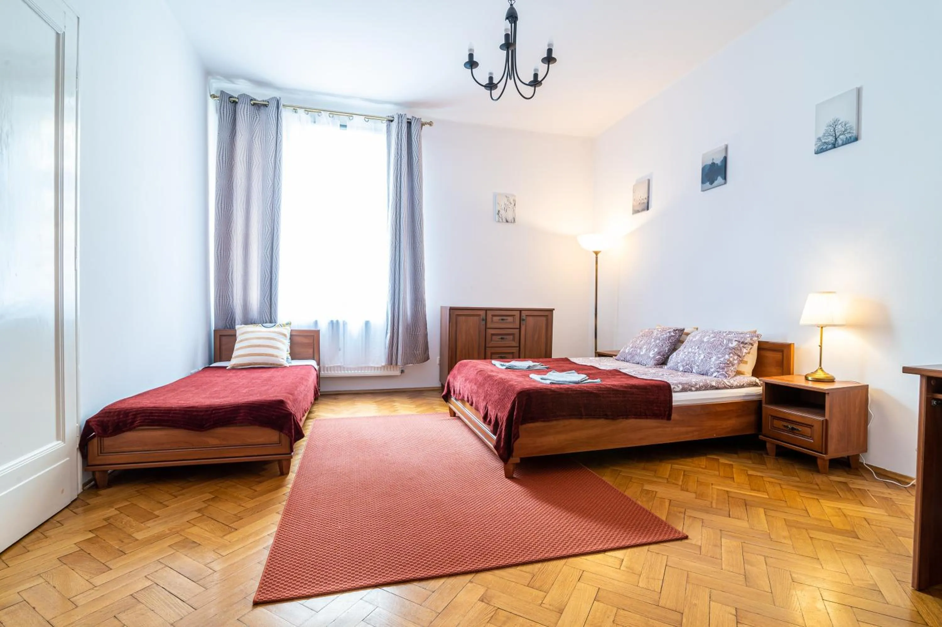 Bed in Trip Apartments