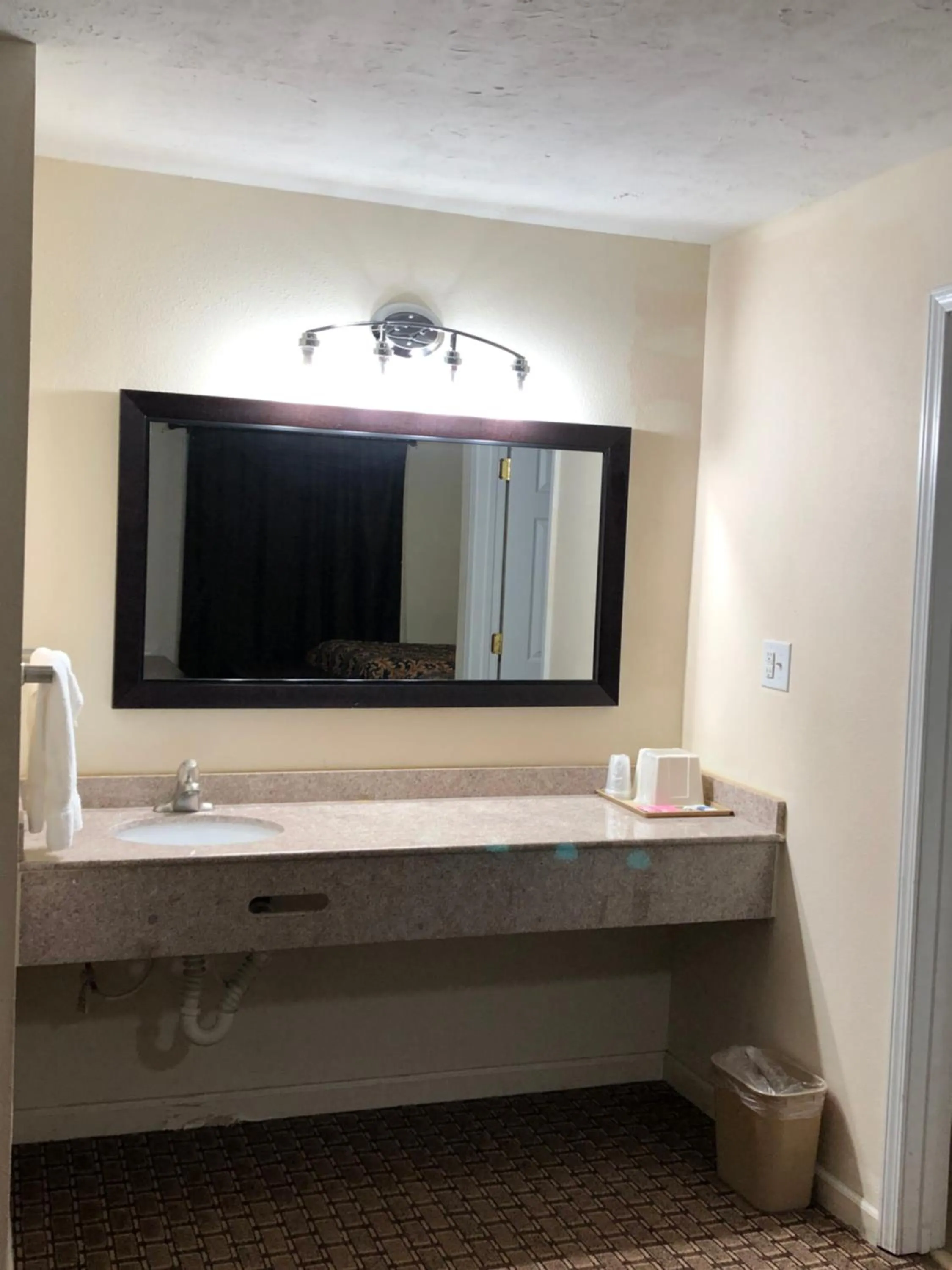 Bathroom in Travelers Inn Motel