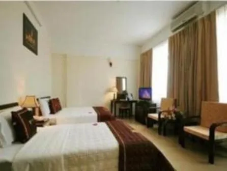 Bed in Lam Bao Long Hotel