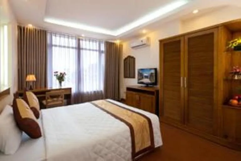 Bed in Lam Bao Long Hotel