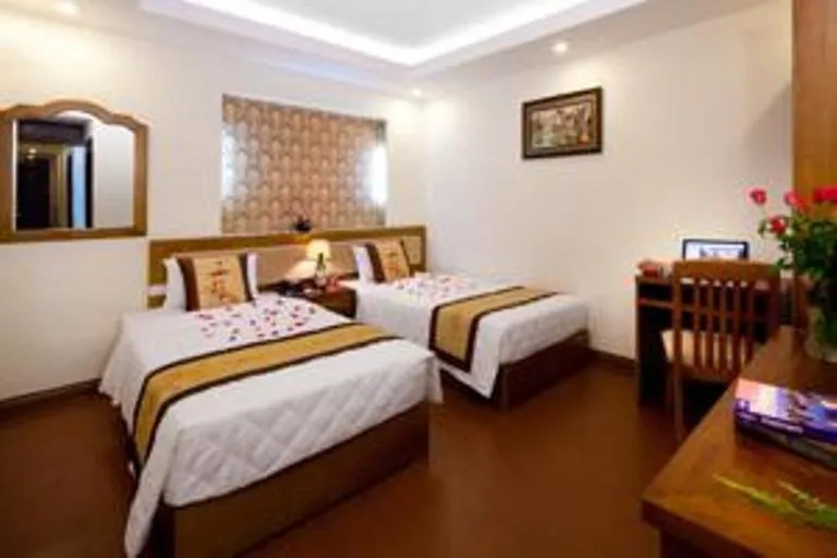 Bed in Lam Bao Long Hotel