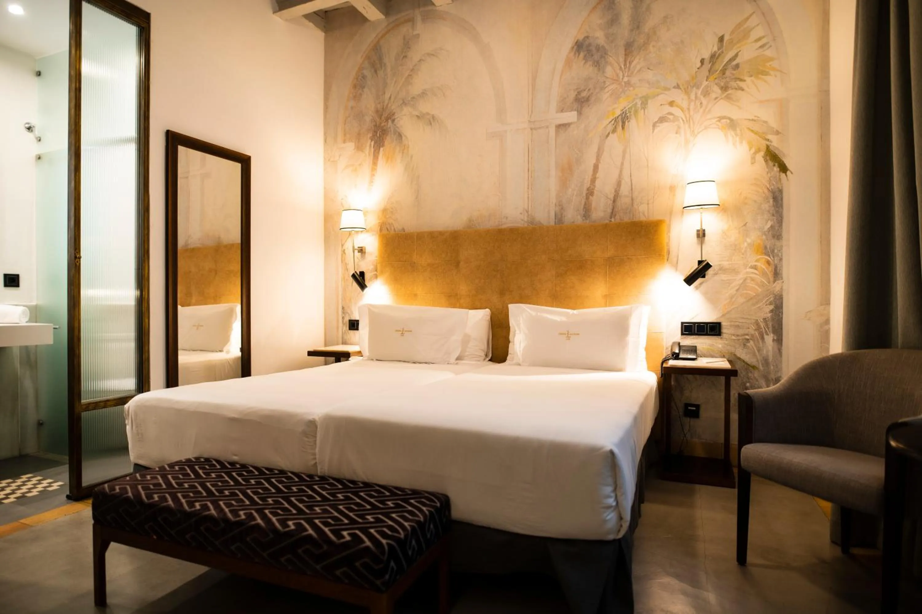 Bed in Legado Alcazar Hotel