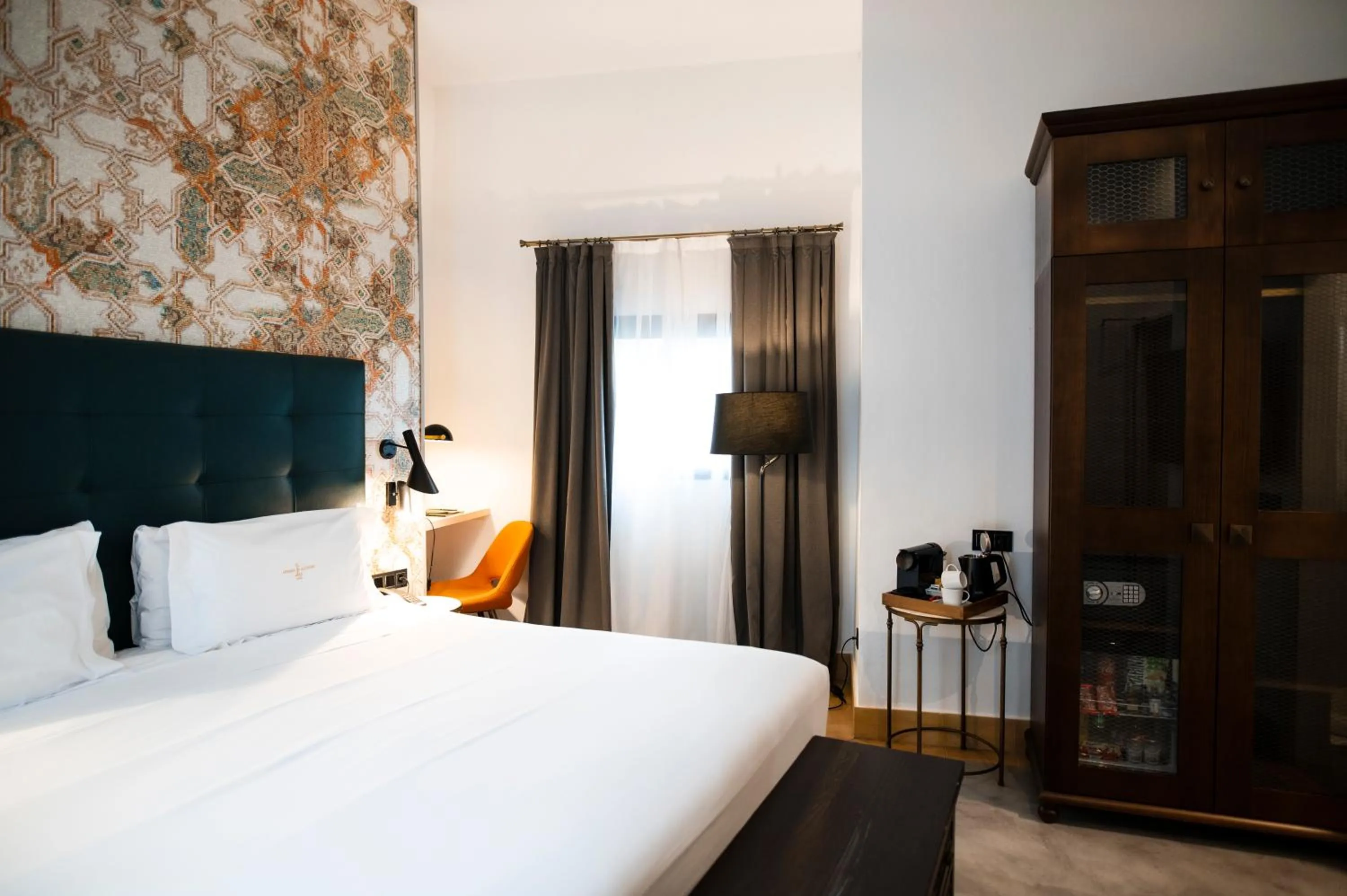 Bed in Legado Alcazar Hotel