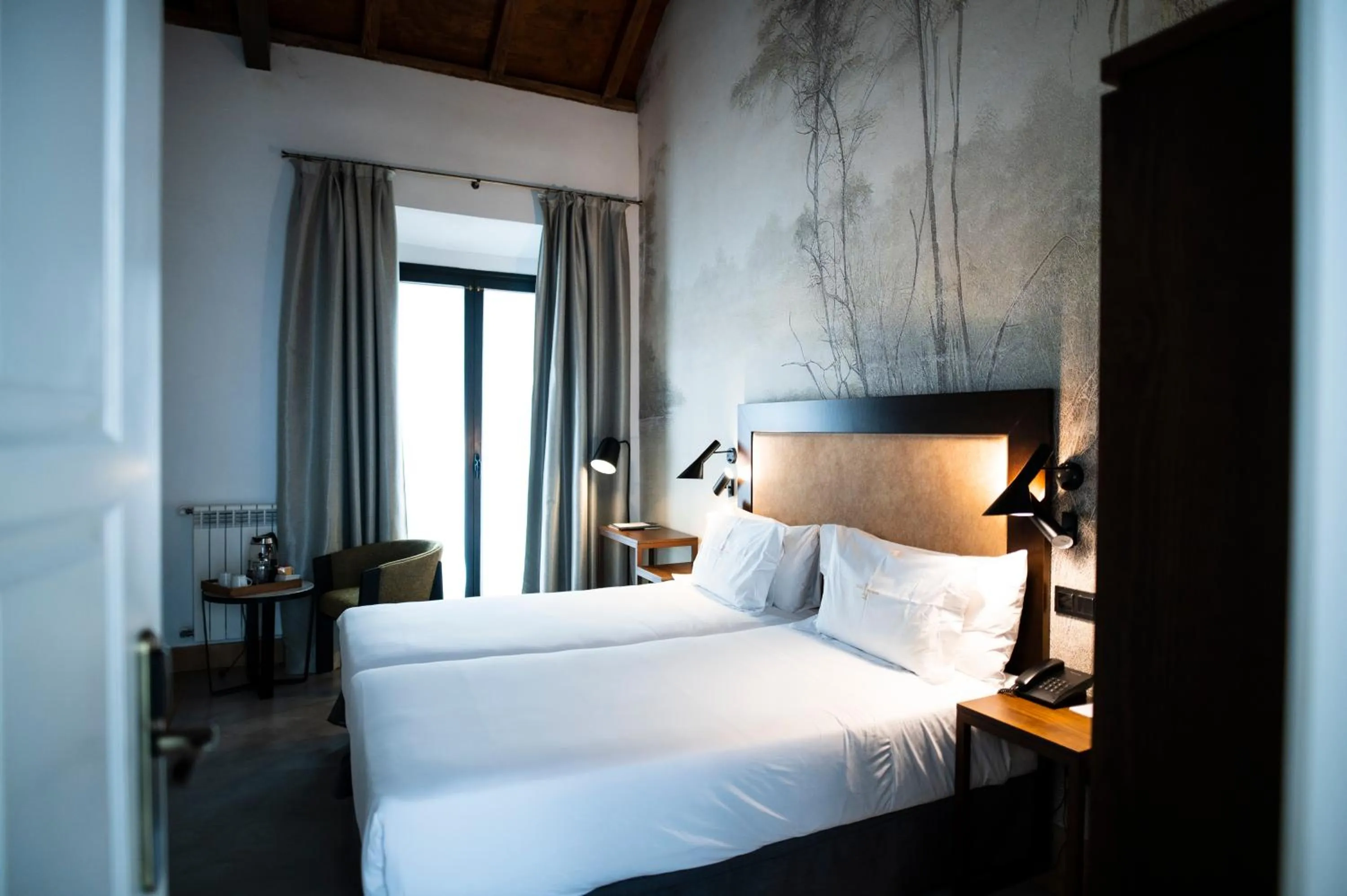 Bed in Legado Alcazar Hotel