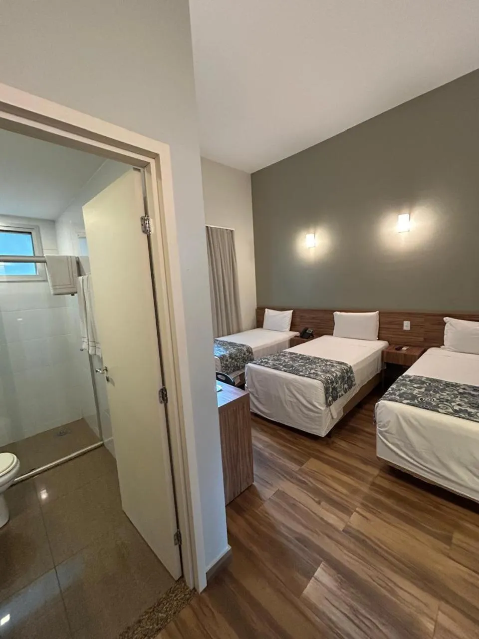 Photo of the whole room, Bed in Impar Suites Barao de Cocais