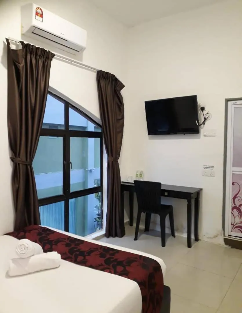 Bed in Max Ferringhi Hotel