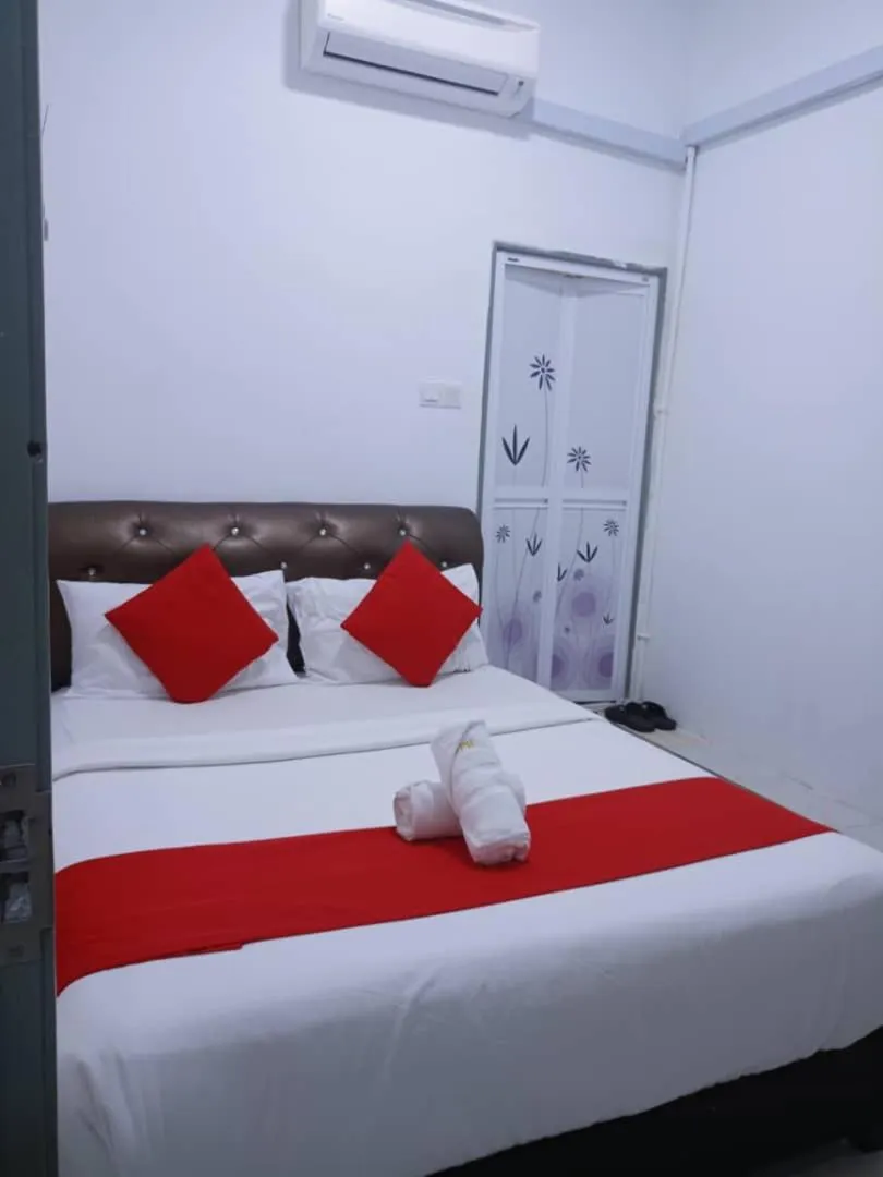 Bed in Max Ferringhi Hotel