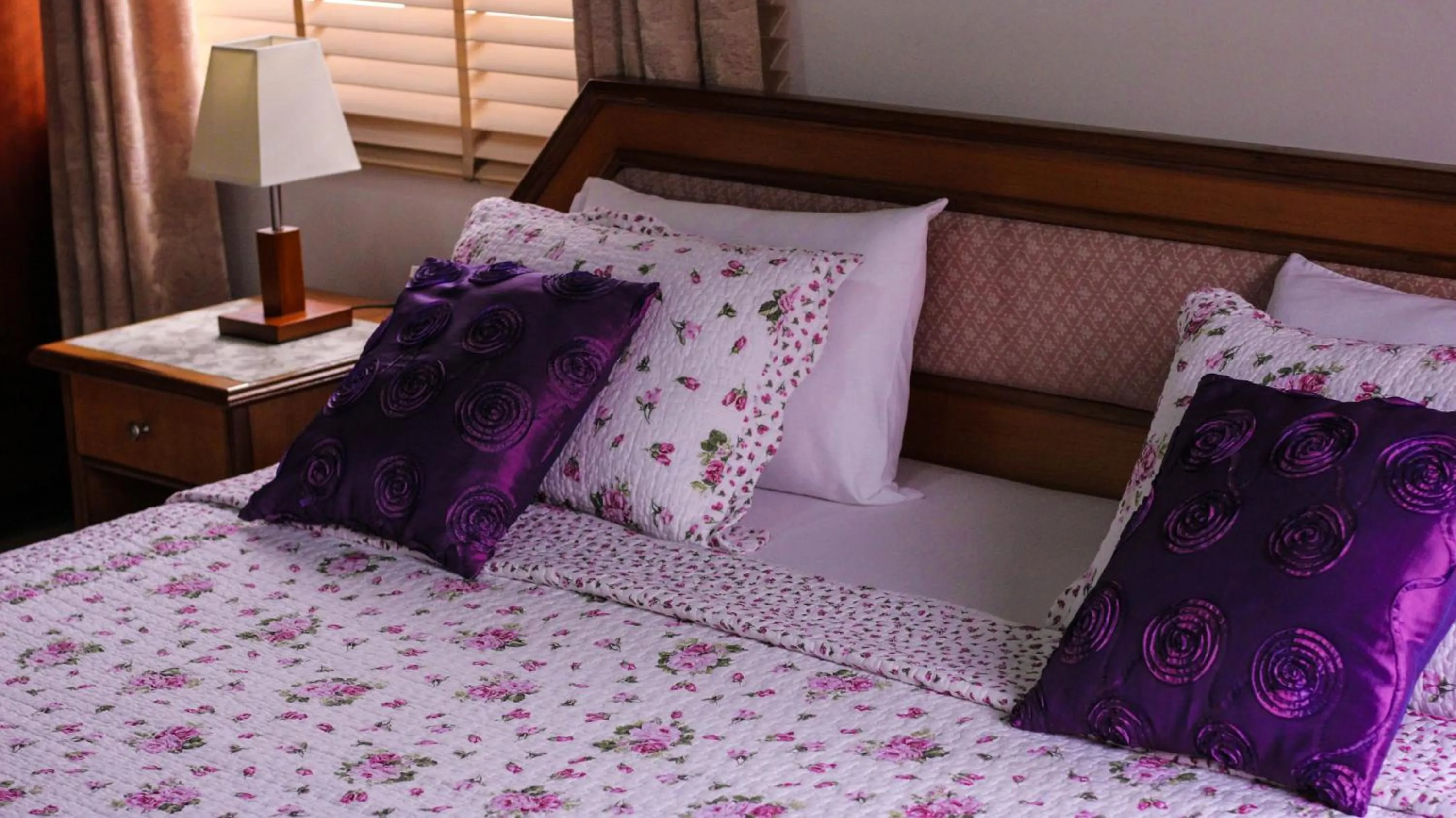 Bed in Lavender Lodge Hotel