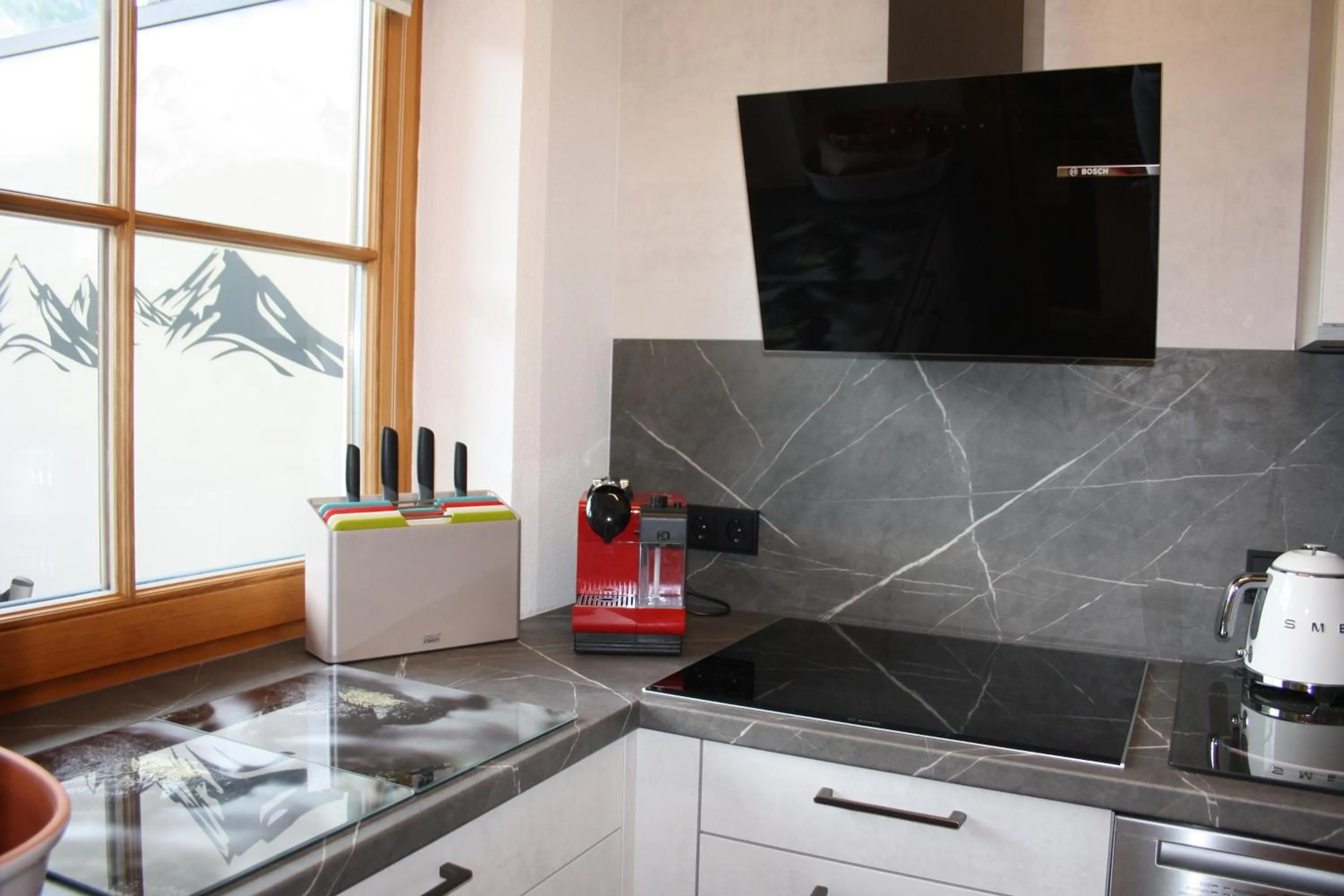 Kitchen or kitchenette in Vronis Waldhaus ADULTS ONLY