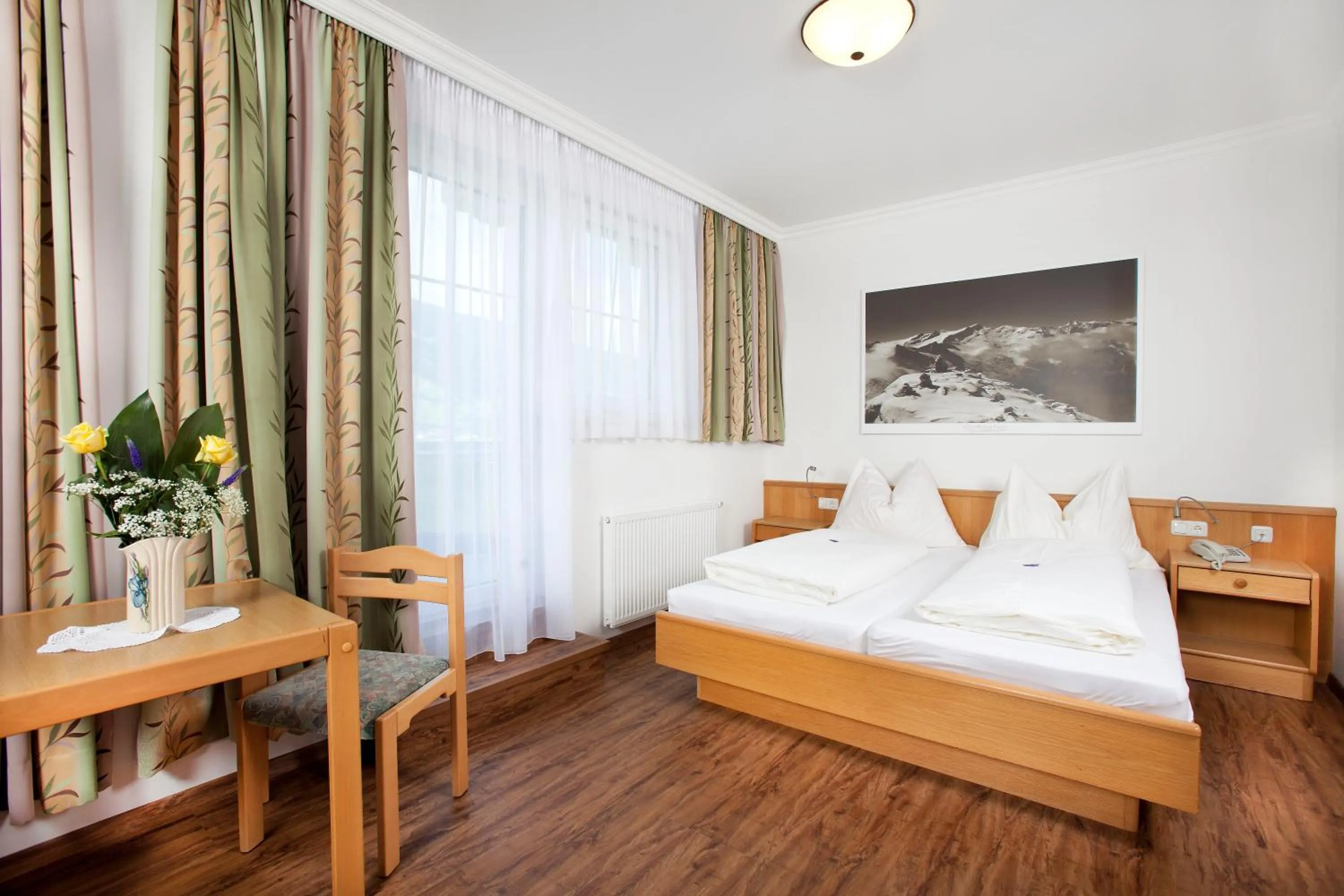 Bed in Hotel Grundlhof