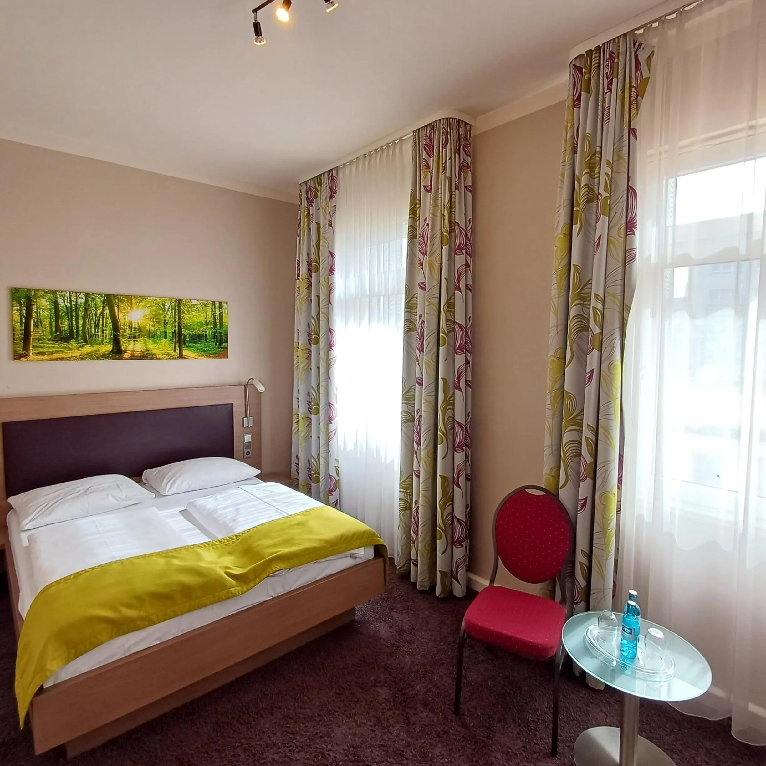 Bed in TRIP INN PostHotel Düren