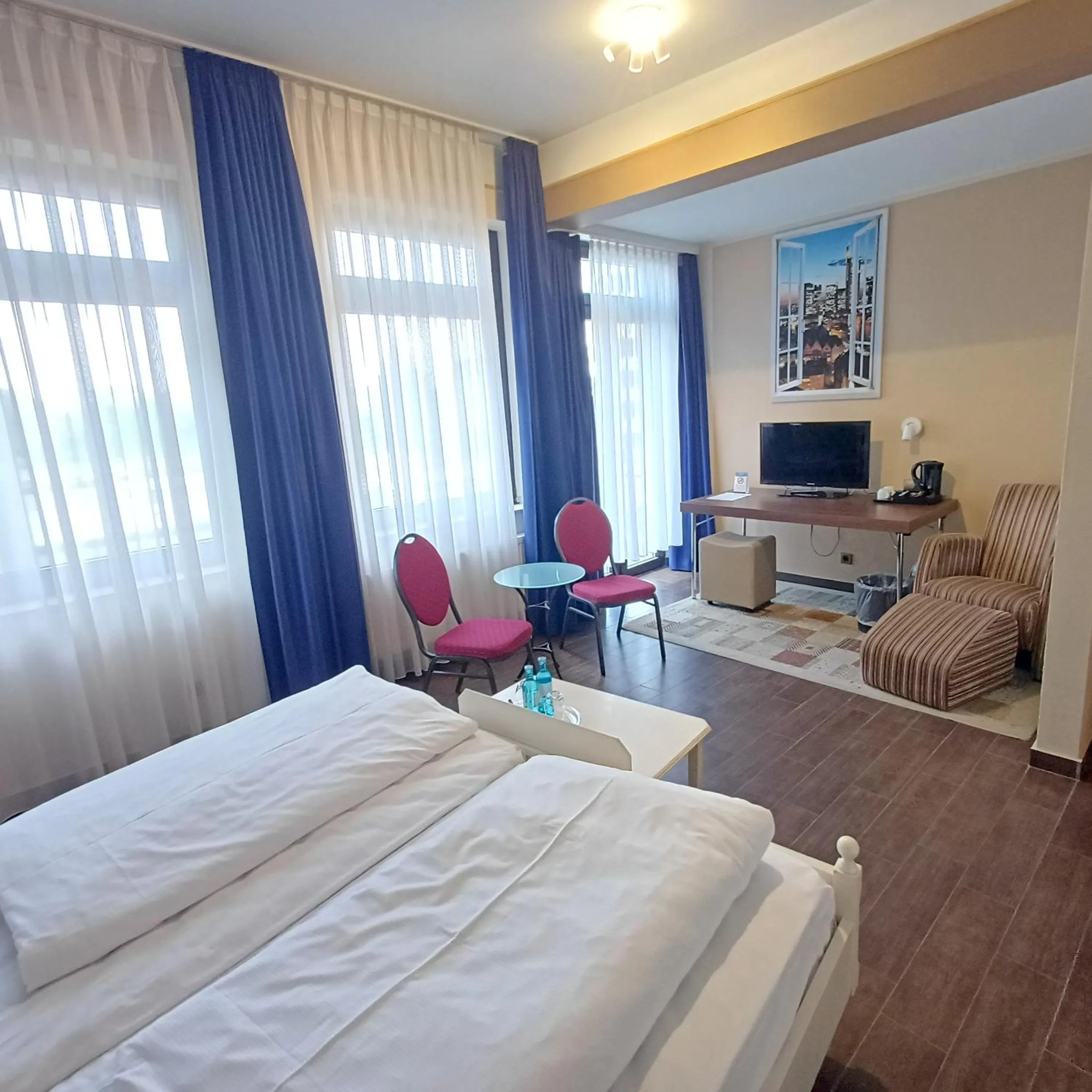 Photo of the whole room, Bed in TRIP INN PostHotel Düren