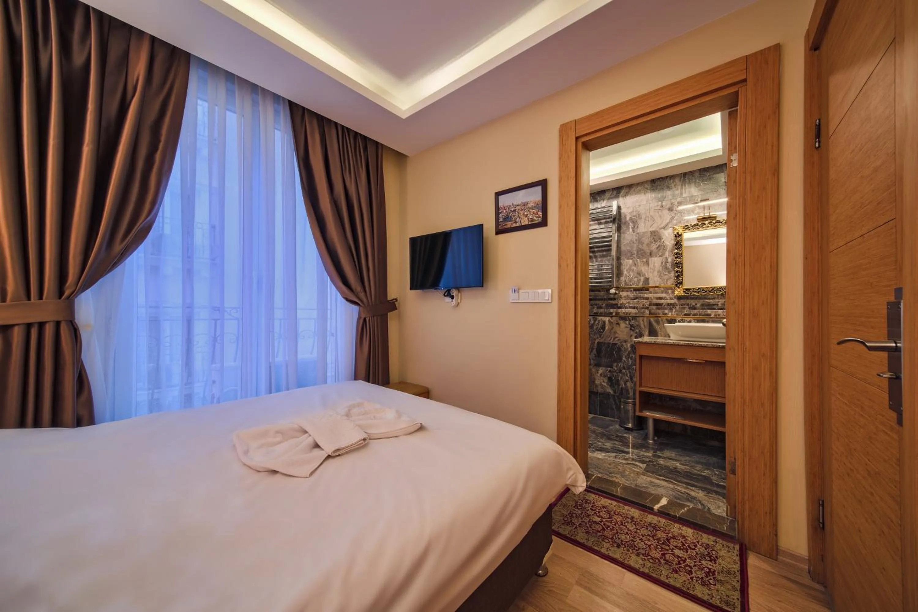 Bed in Gulhane Corner Hotel