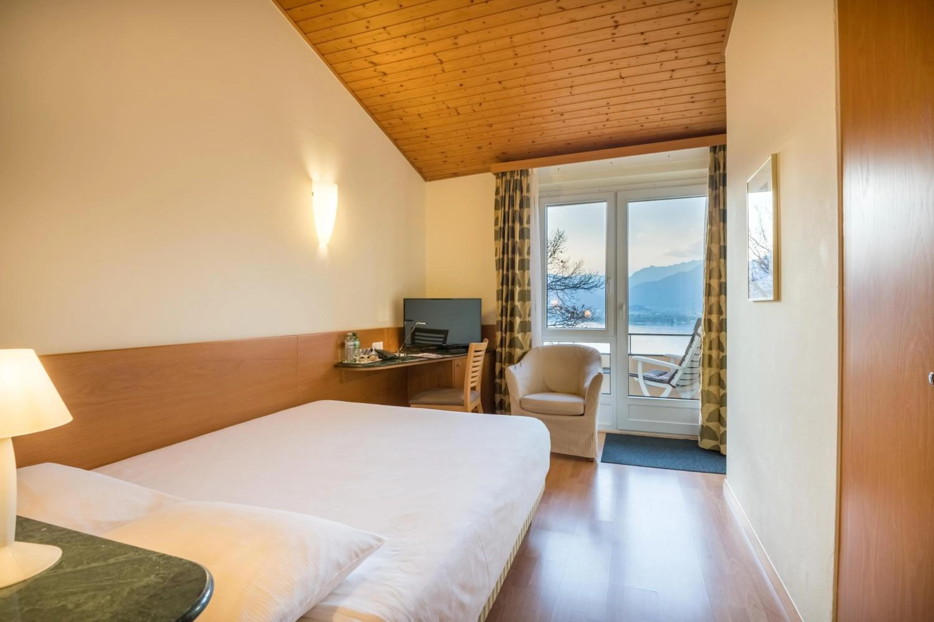 Small Grandlit Double Room with Balcony or Terrace in Bellavista Swiss Quality Hotel