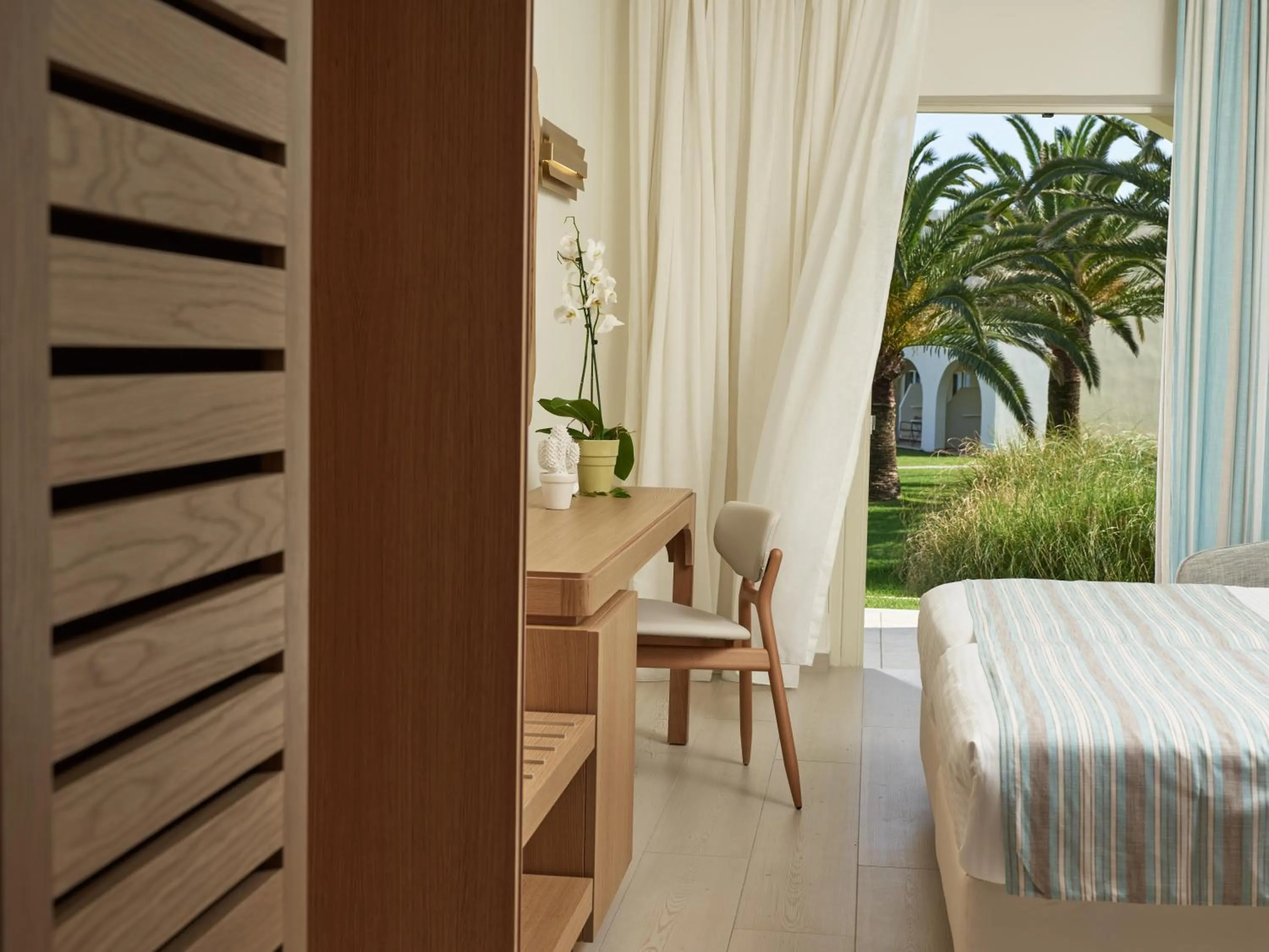 Photo of the whole room, Bed in Pilot Beach Resort