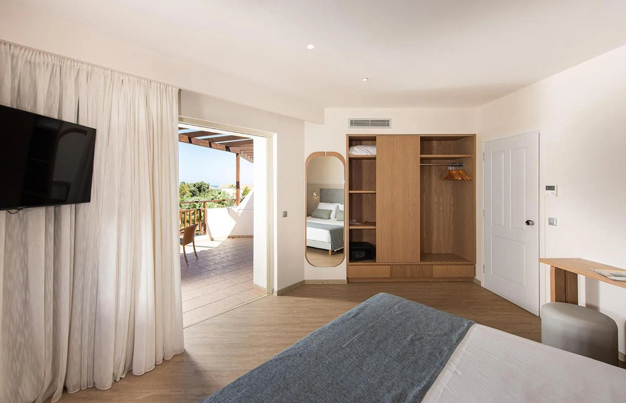 Photo of the whole room, Bed in Pilot Beach Resort