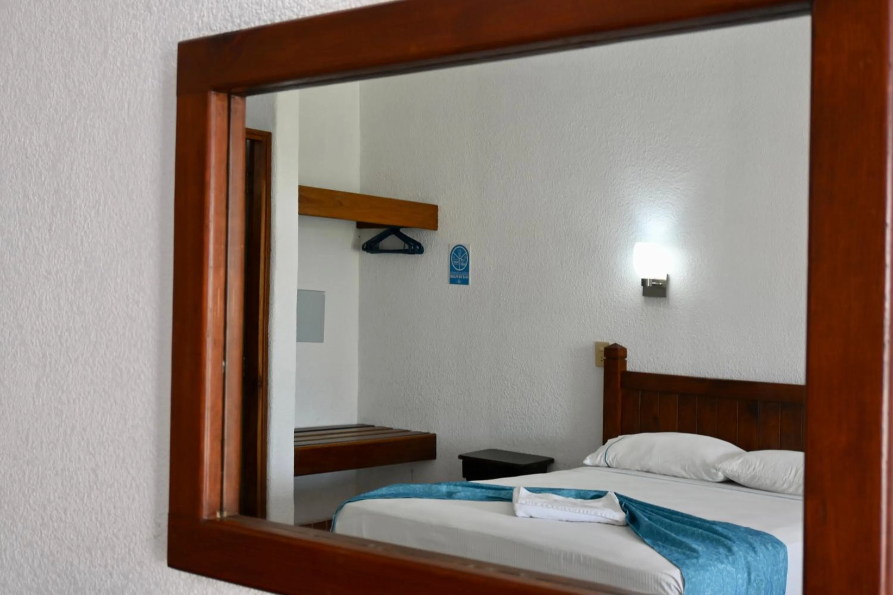 Bed in Pelicano Inn Playa del Carmen - Beachfront Hotel