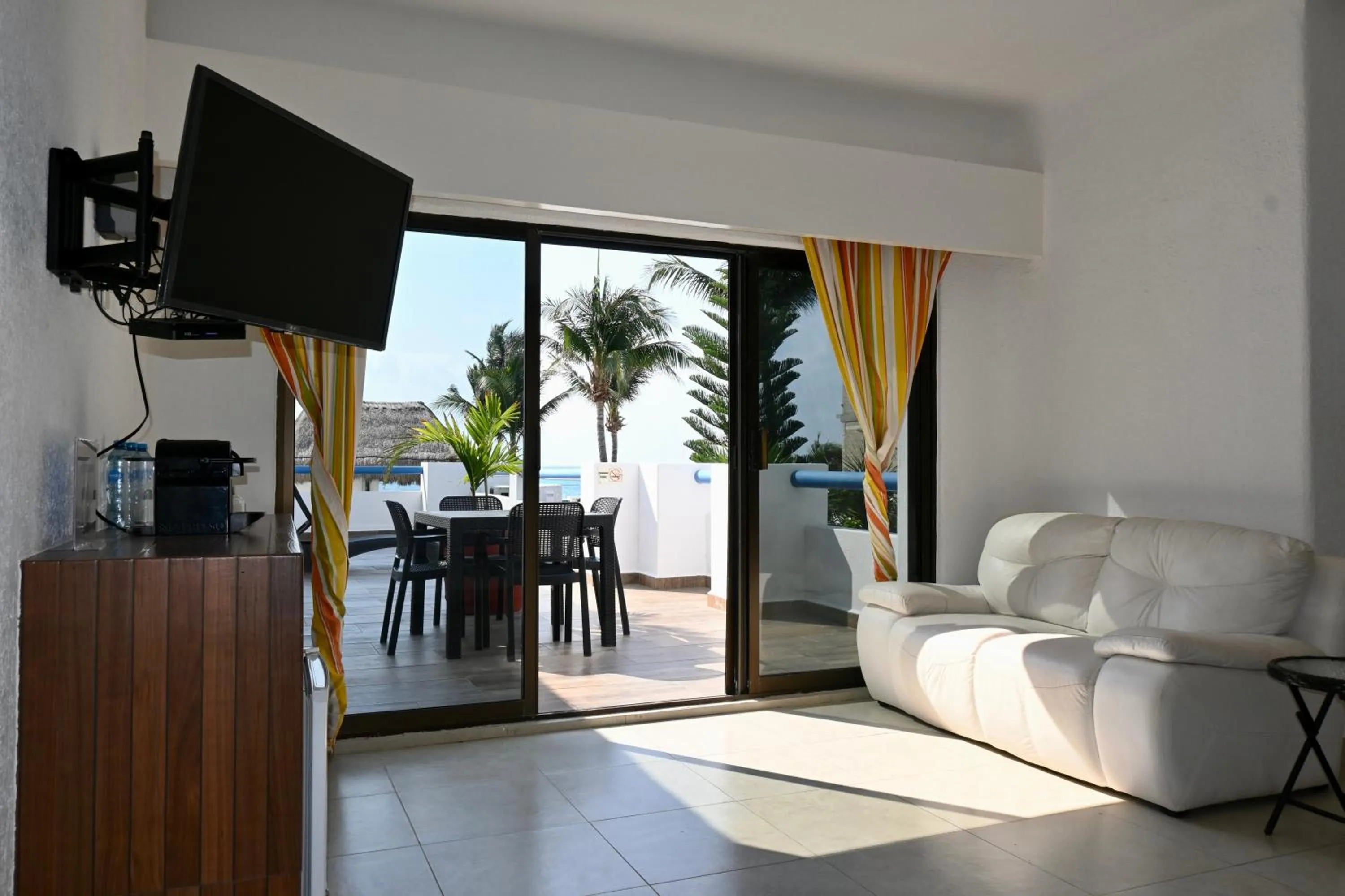 Living room in Pelicano Inn Playa del Carmen - Beachfront Hotel