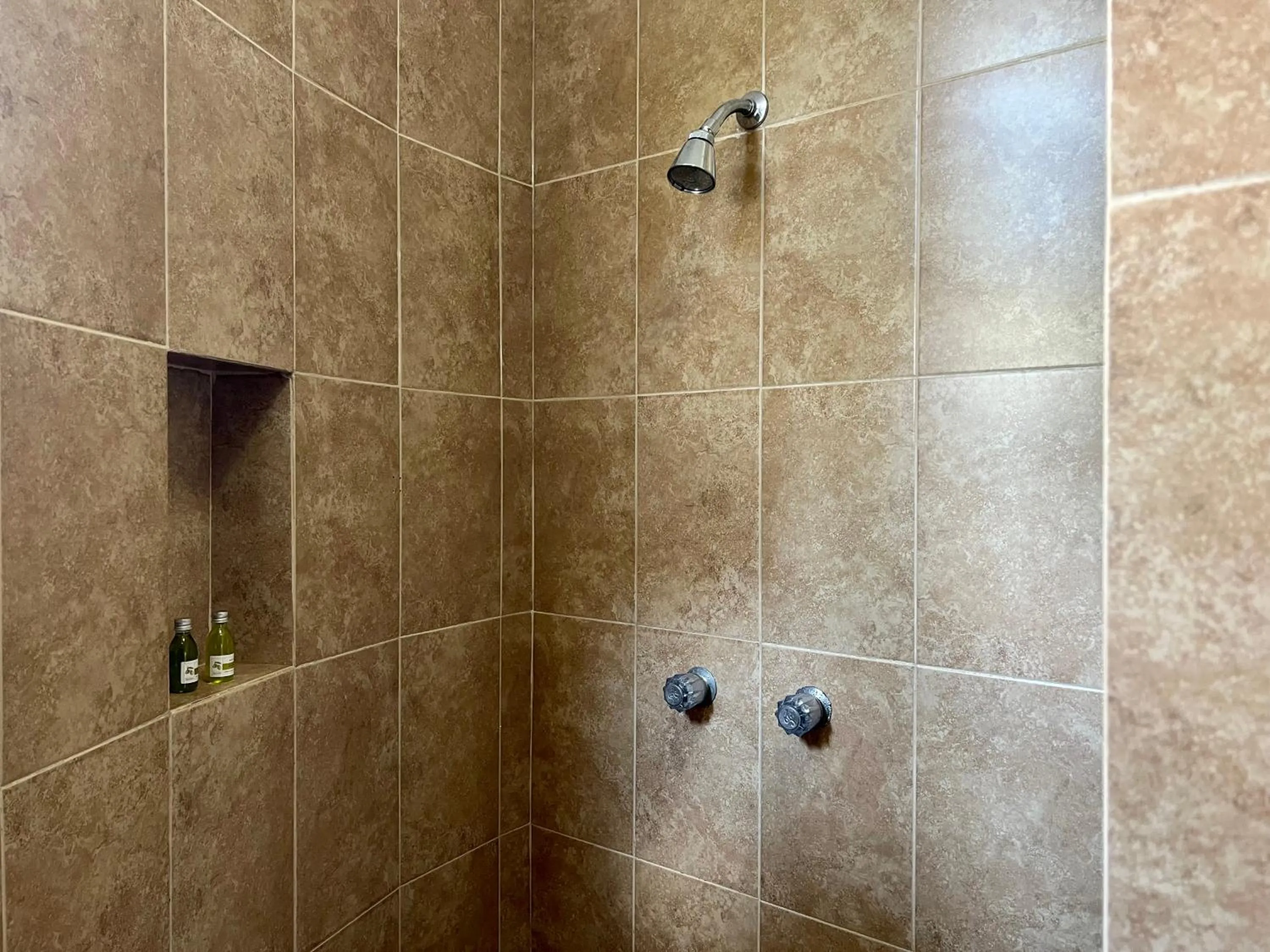 Shower in Pelicano Inn Playa del Carmen - Beachfront Hotel