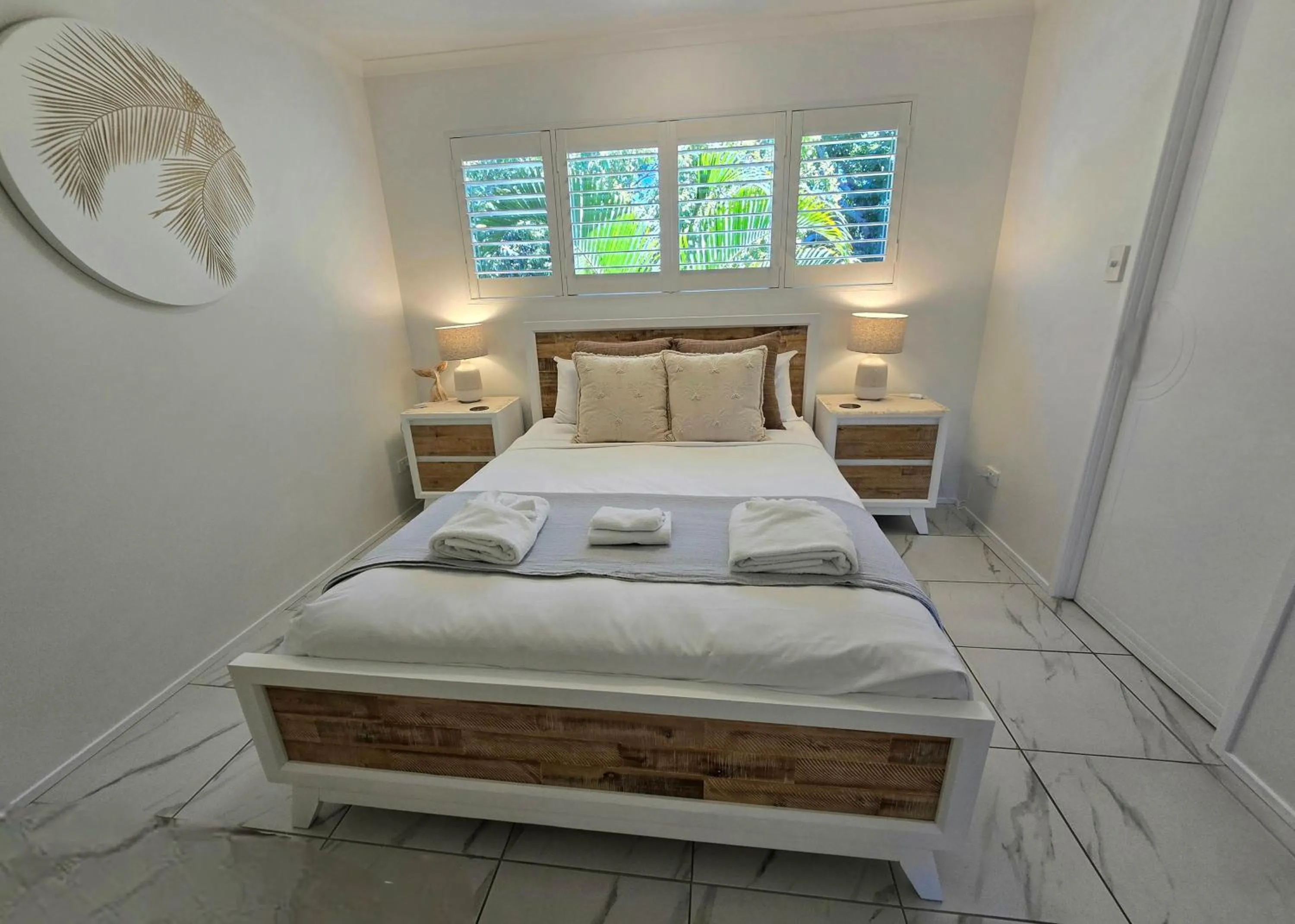 Bed in Noosa River Retreat Holiday Apartments