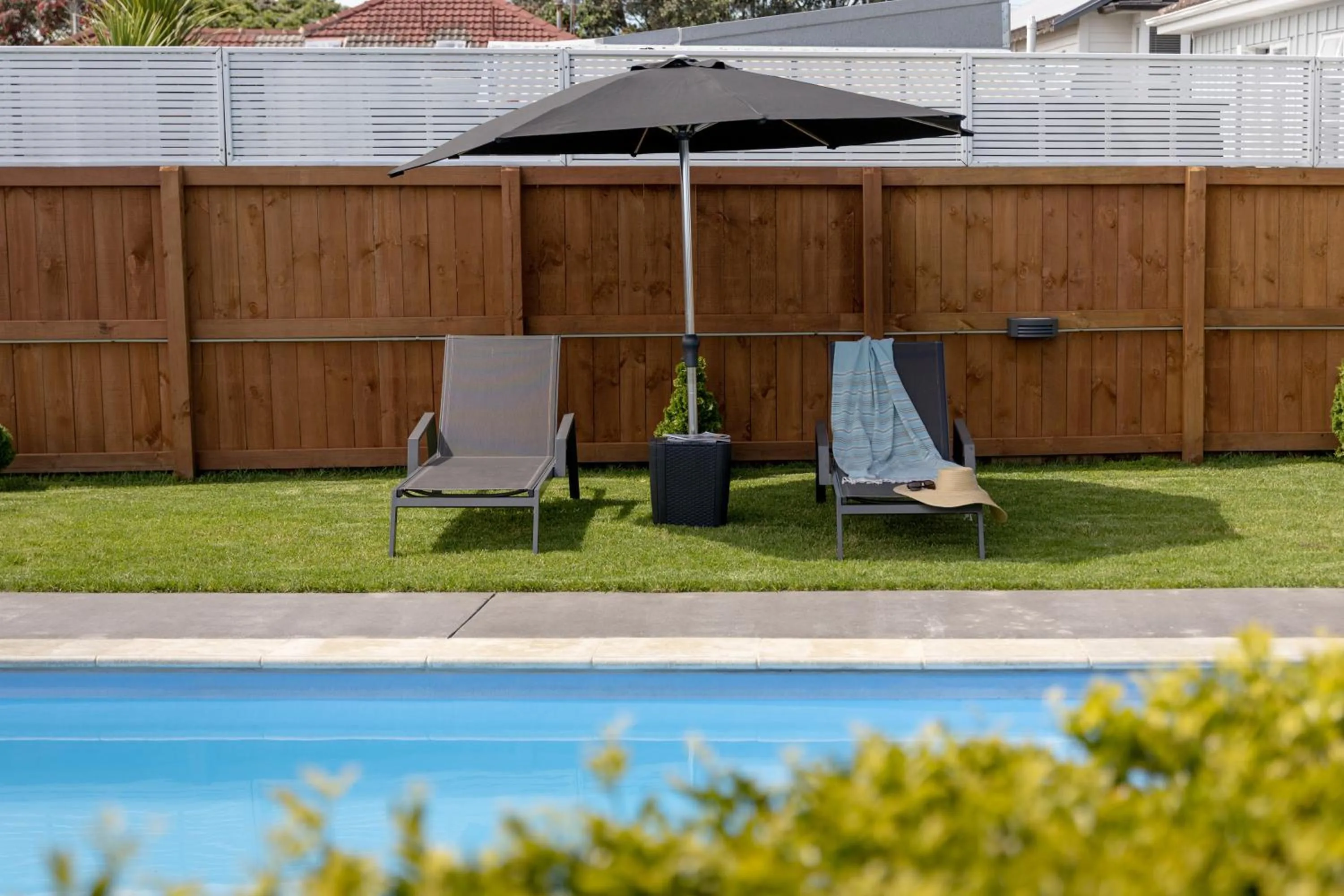 Pool view in Cobblestone Court Motel - Wenzel Motels