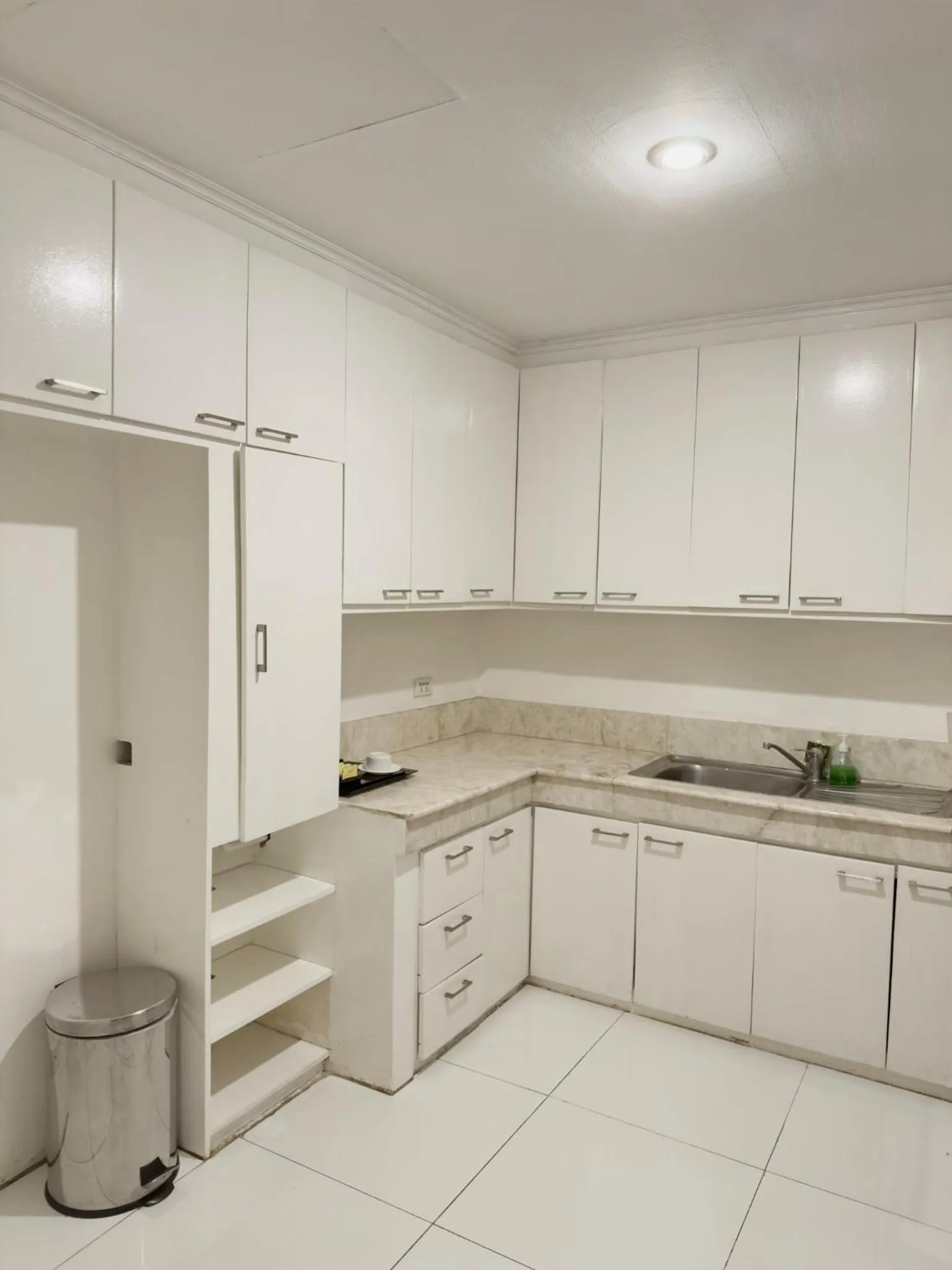 Kitchen or kitchenette in Parque España Residence Hotel