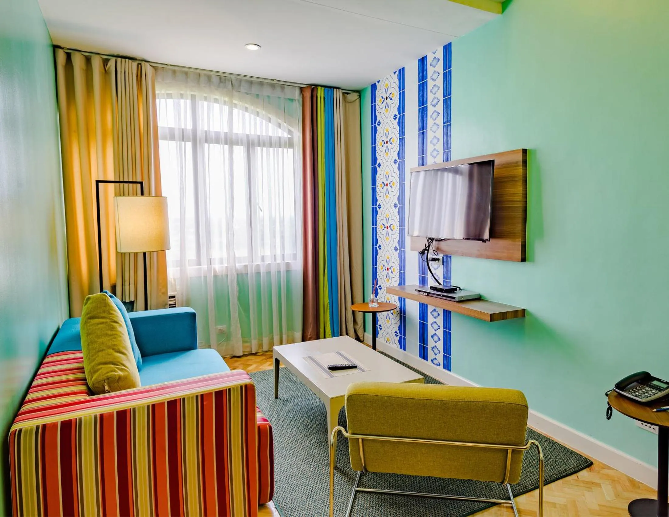 TV and multimedia in Parque España Residence Hotel