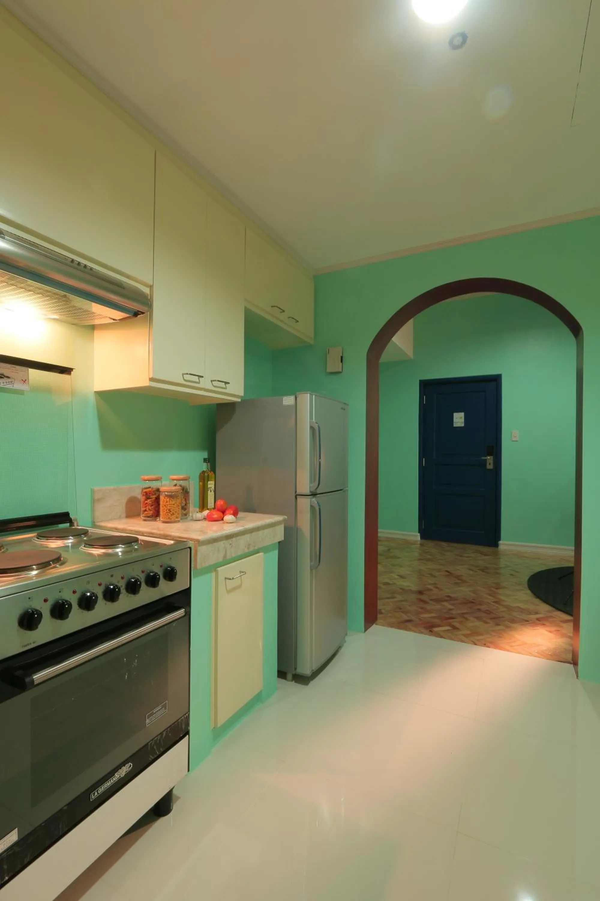 Kitchen or kitchenette in Parque España Residence Hotel