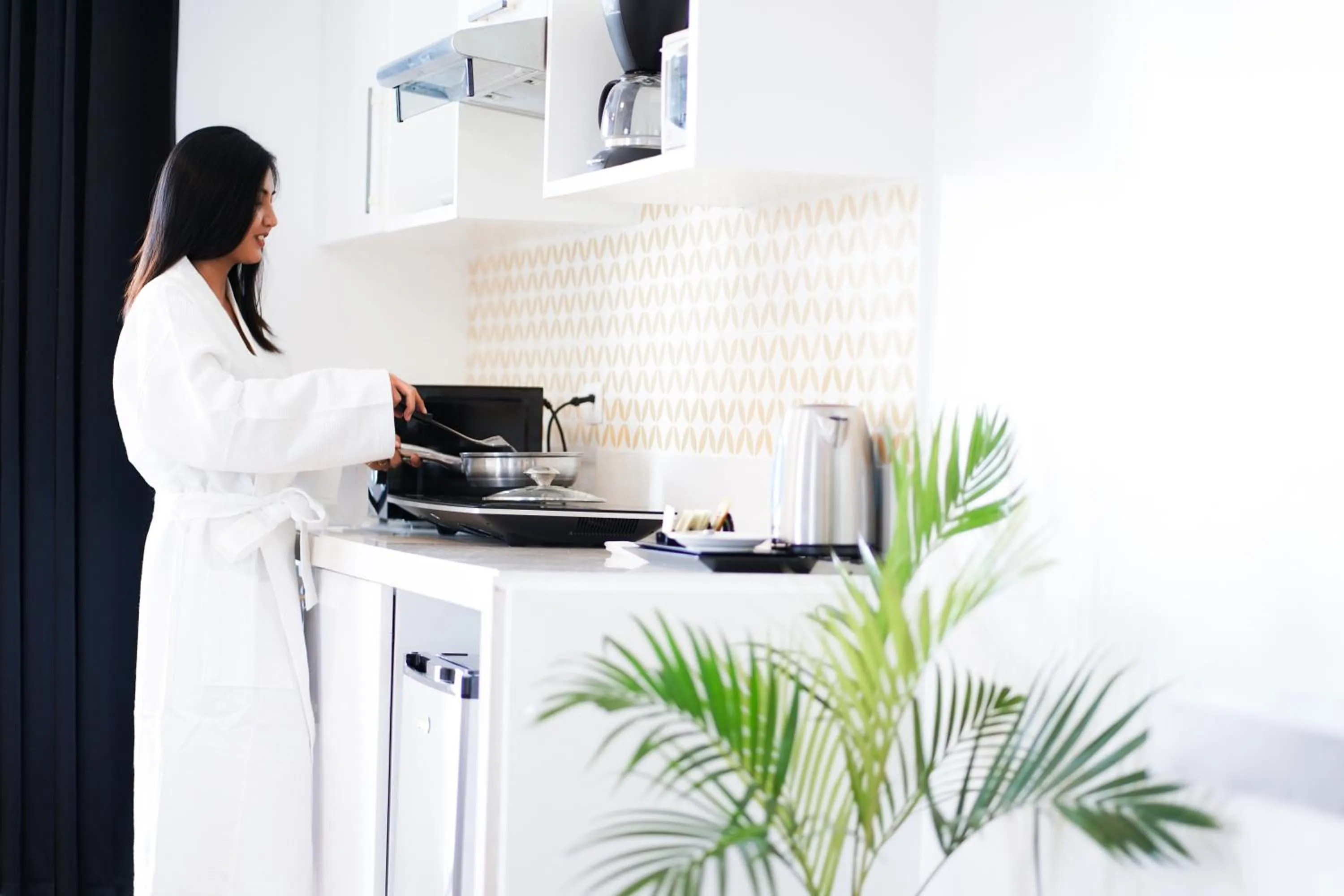 Kitchen or kitchenette in Parque España Residence Hotel