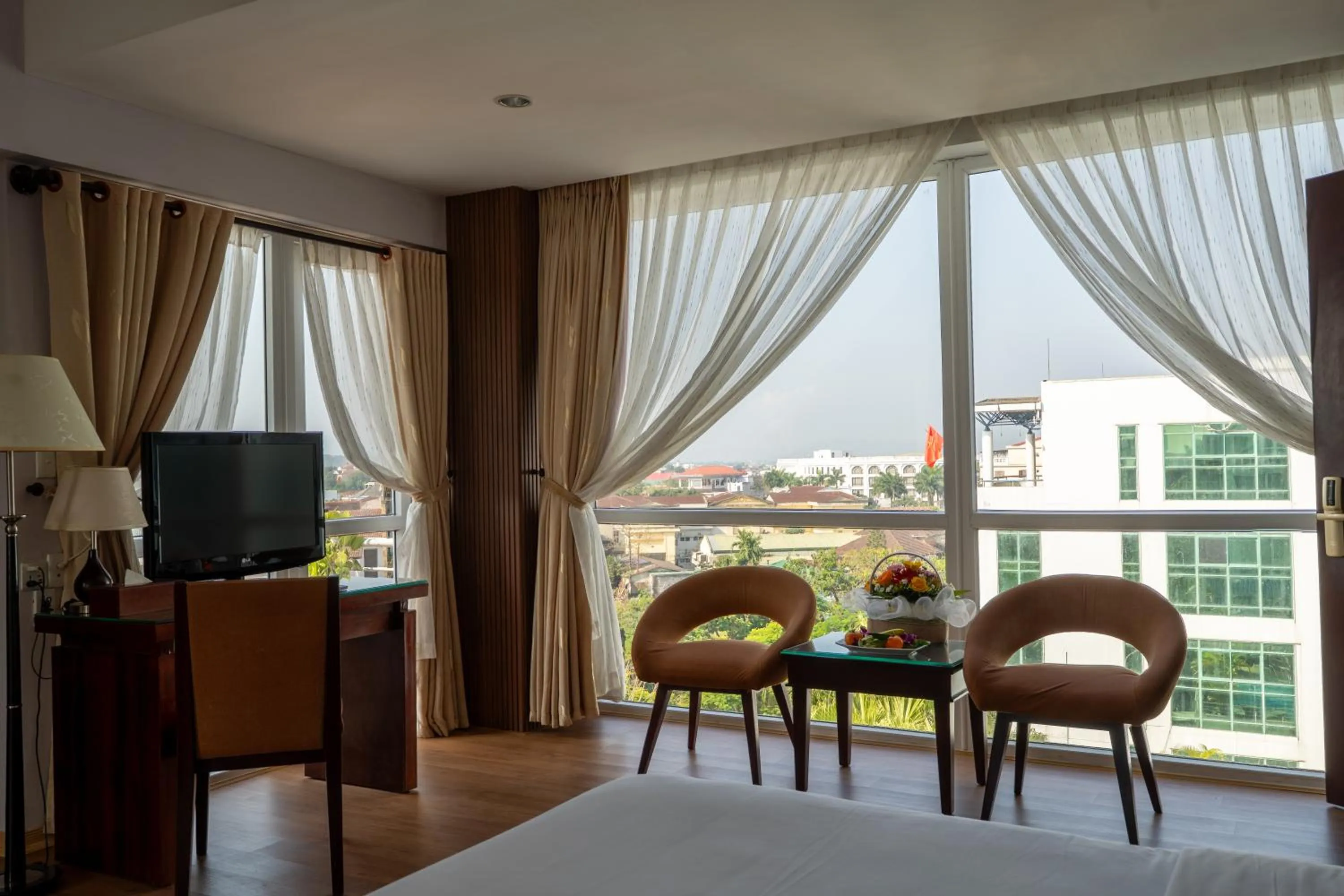 View (from property/room), Bed in Mondial Hotel Hue