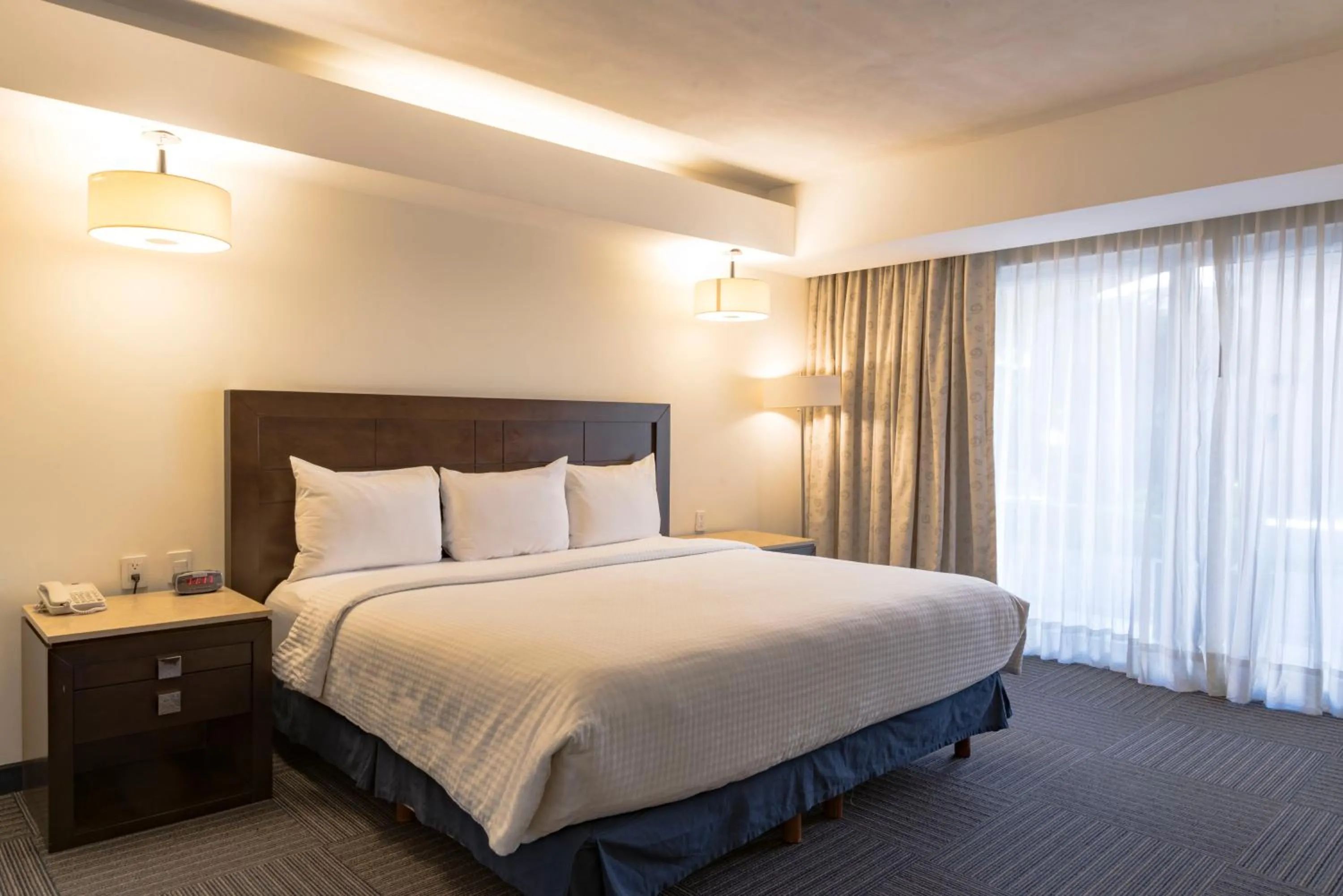 Bed in Hotel Ex-Hacienda San Xavier