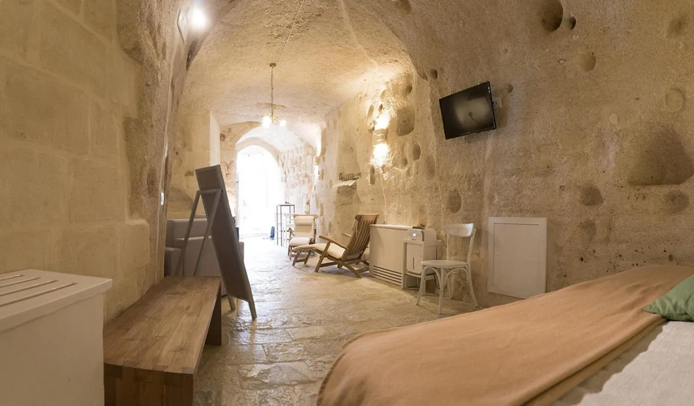 Seating area, Bed in Thymus Residence nei Sassi