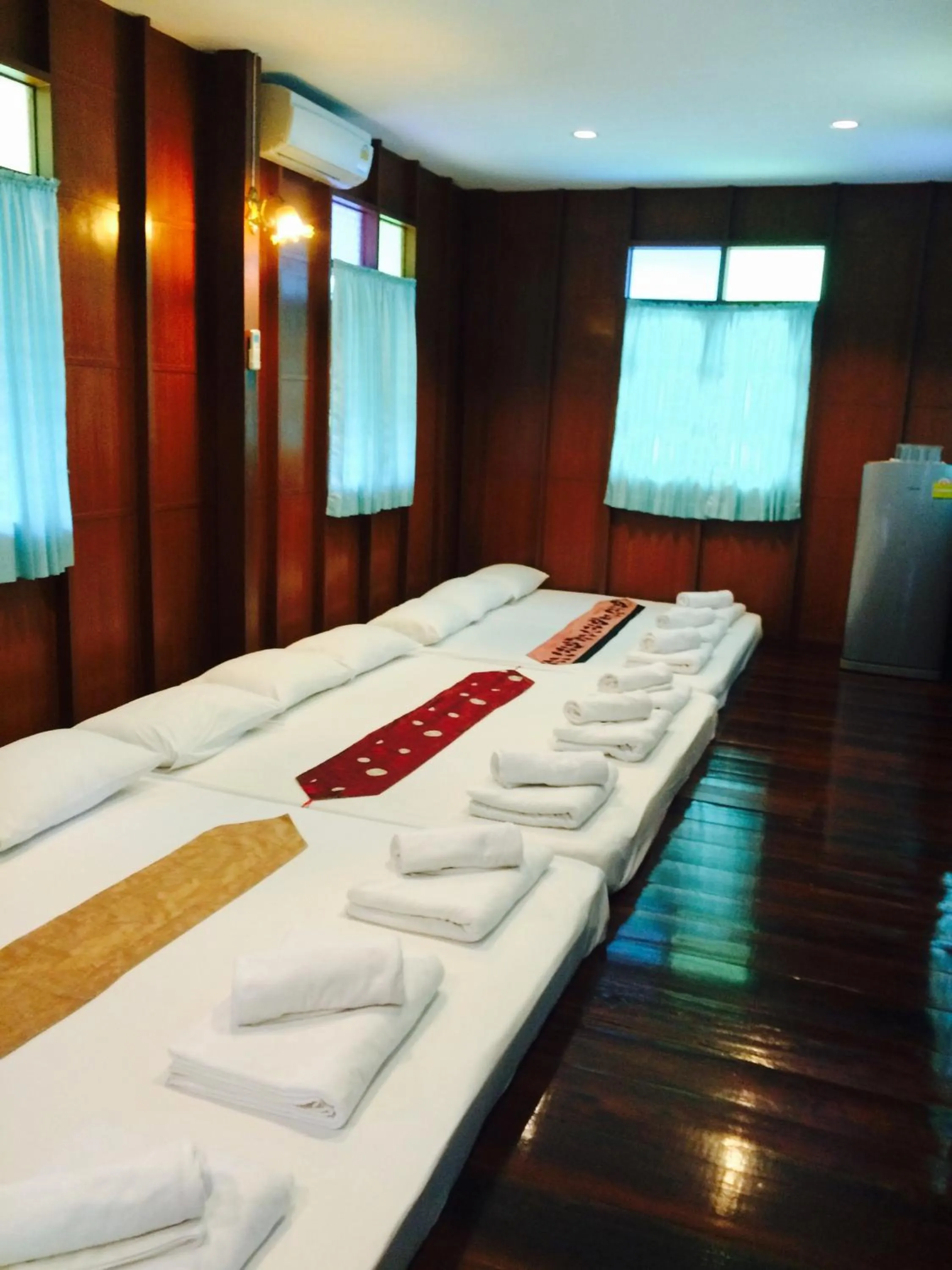 Bed in บ้านกรนรา Baan Kornnara