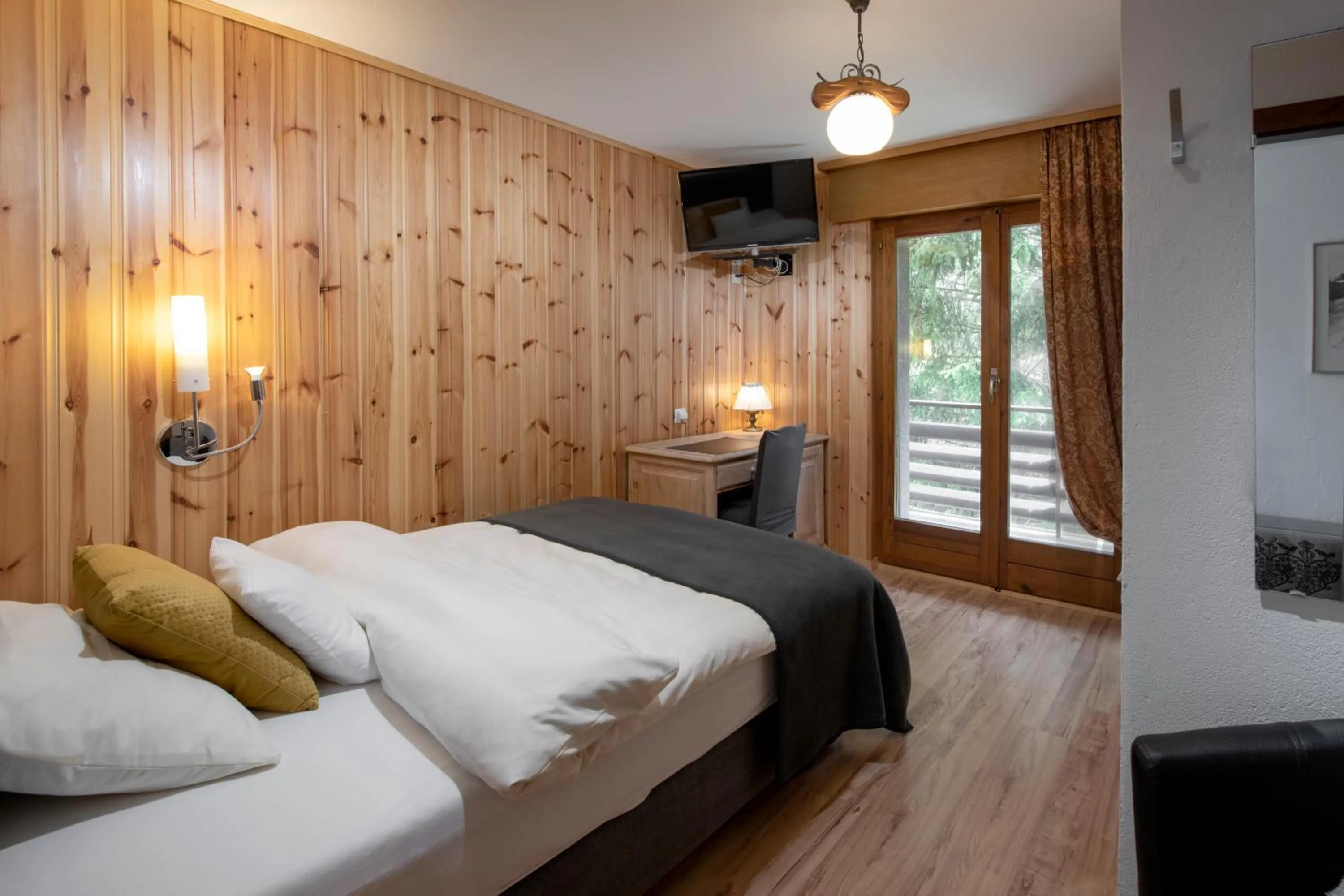 Bed in Hotel le Beausite