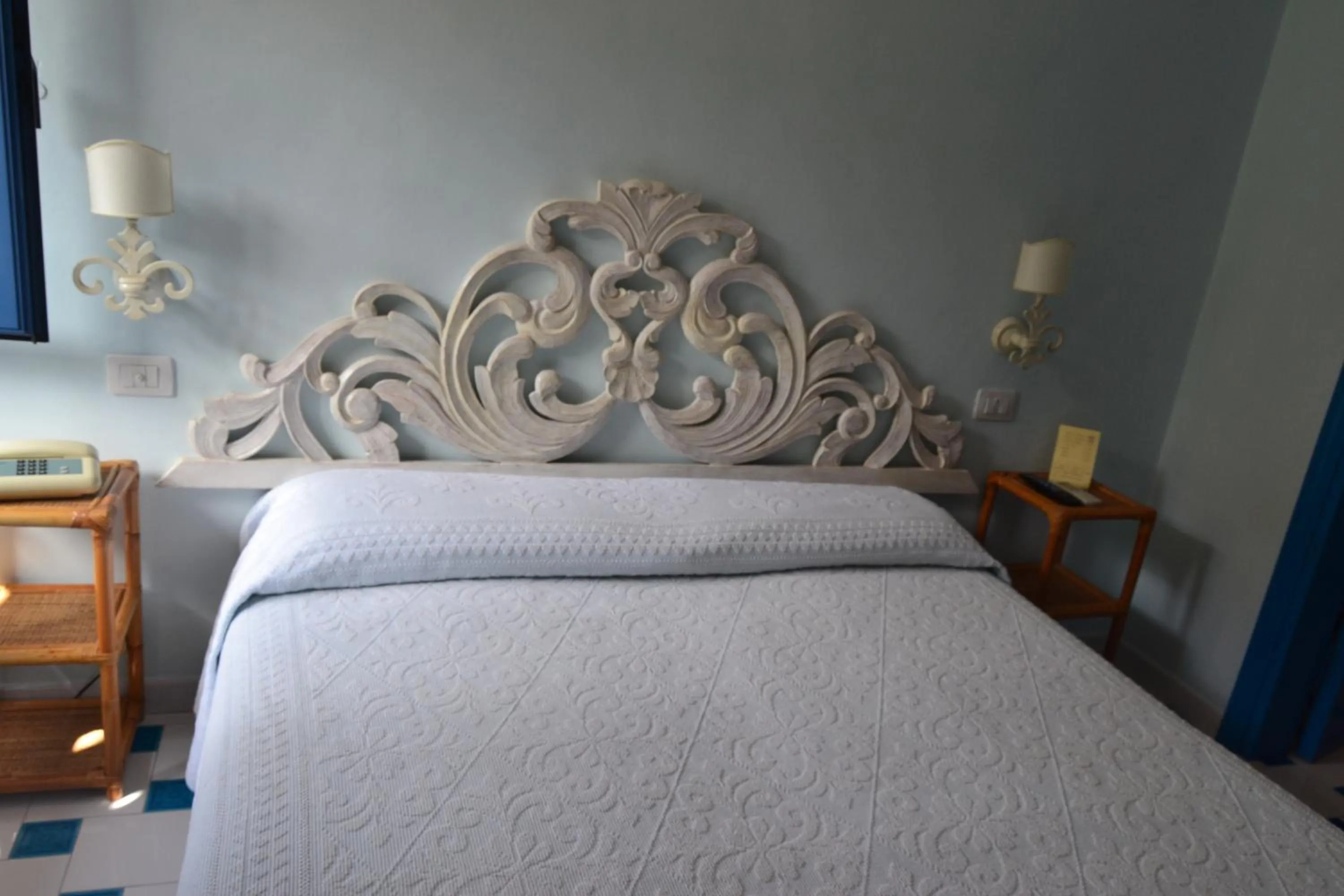 Decorative detail, Bed in Hotel La Lampara