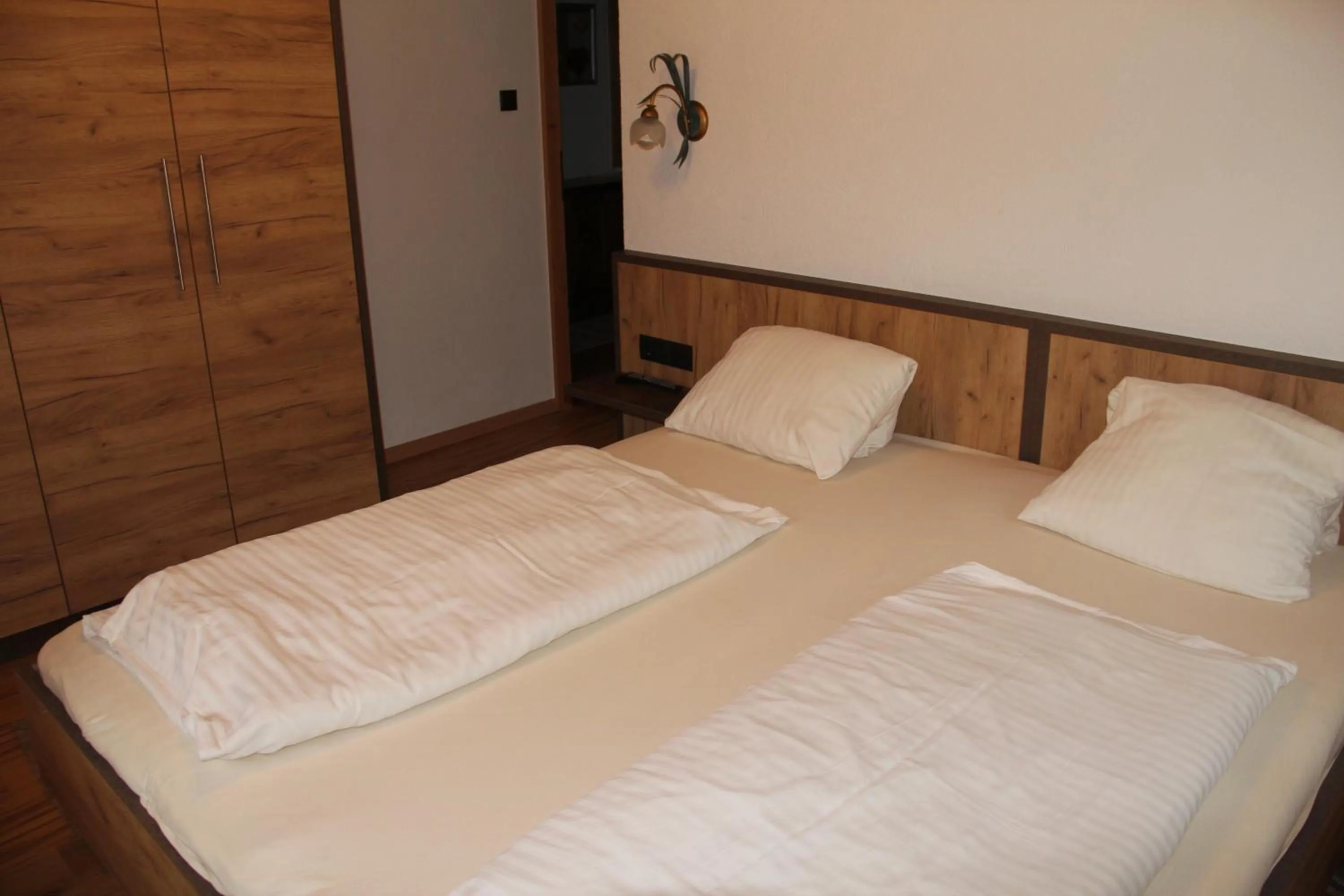 Bed in Hotel Schweizerhof